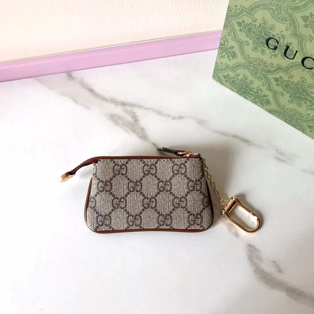 Gucci GG Supreme Key Pouch - DopestKickz