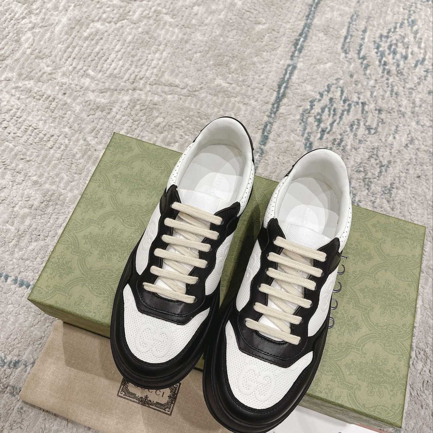 Gucci GG Embossed Sneaker - DopestKickz