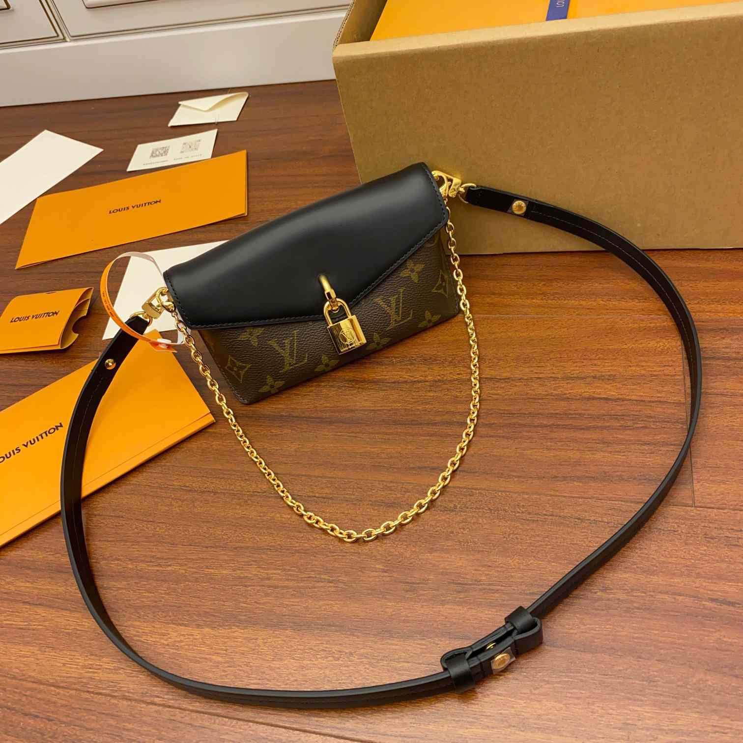 Louis Vuitton Padlock On Strap   M80559 - DopestKickz