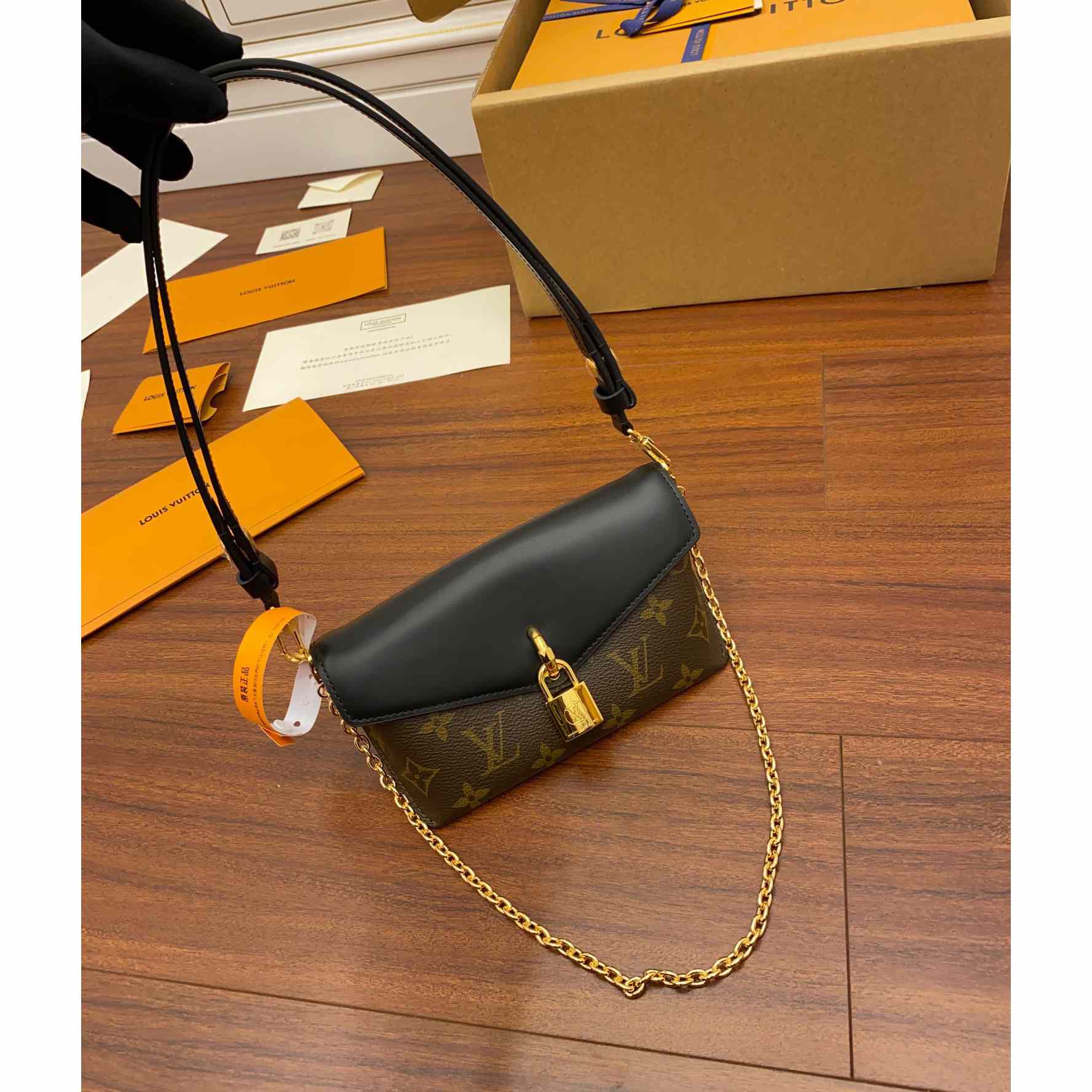 Louis Vuitton Padlock On Strap   M80559 - DopestKickz