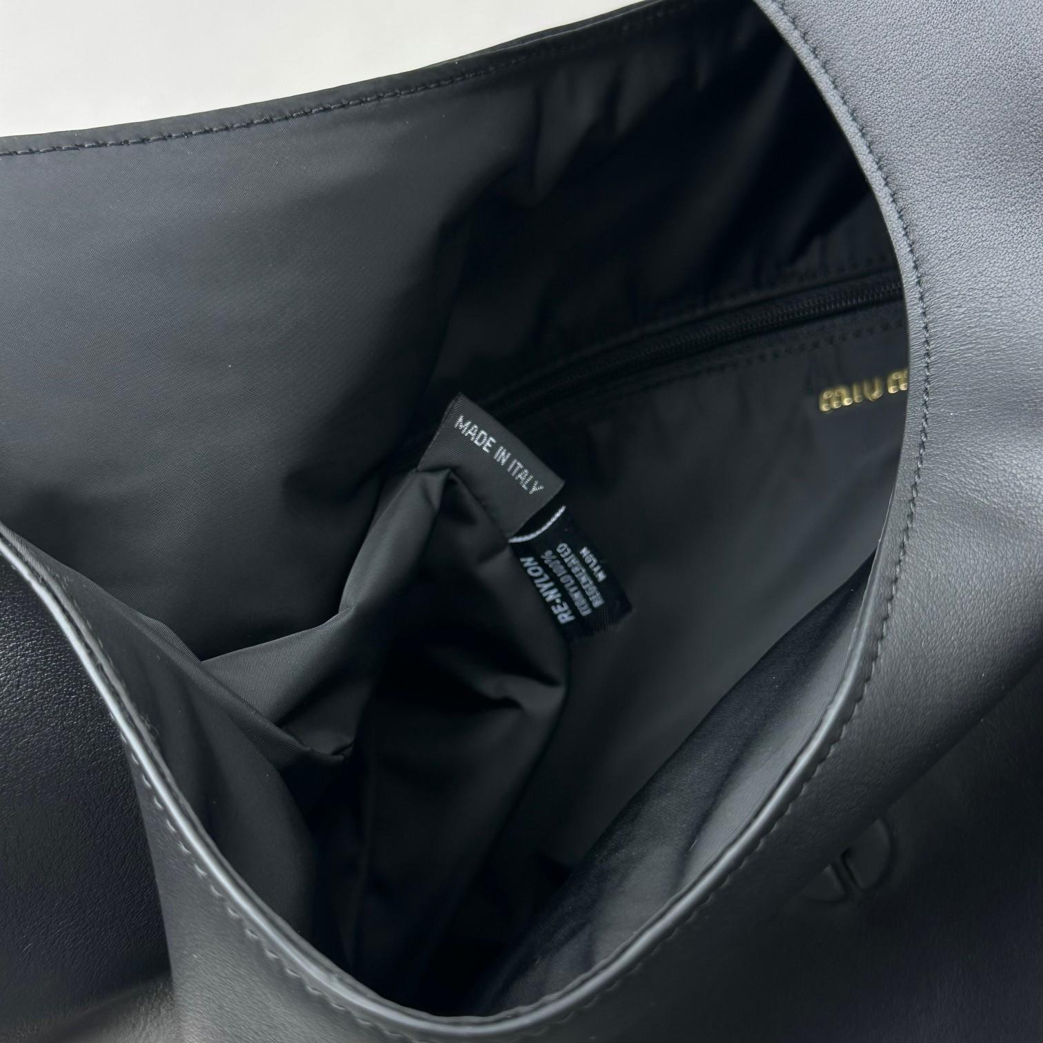 Miu Miu Leather Hobo Bag - DopestKickz