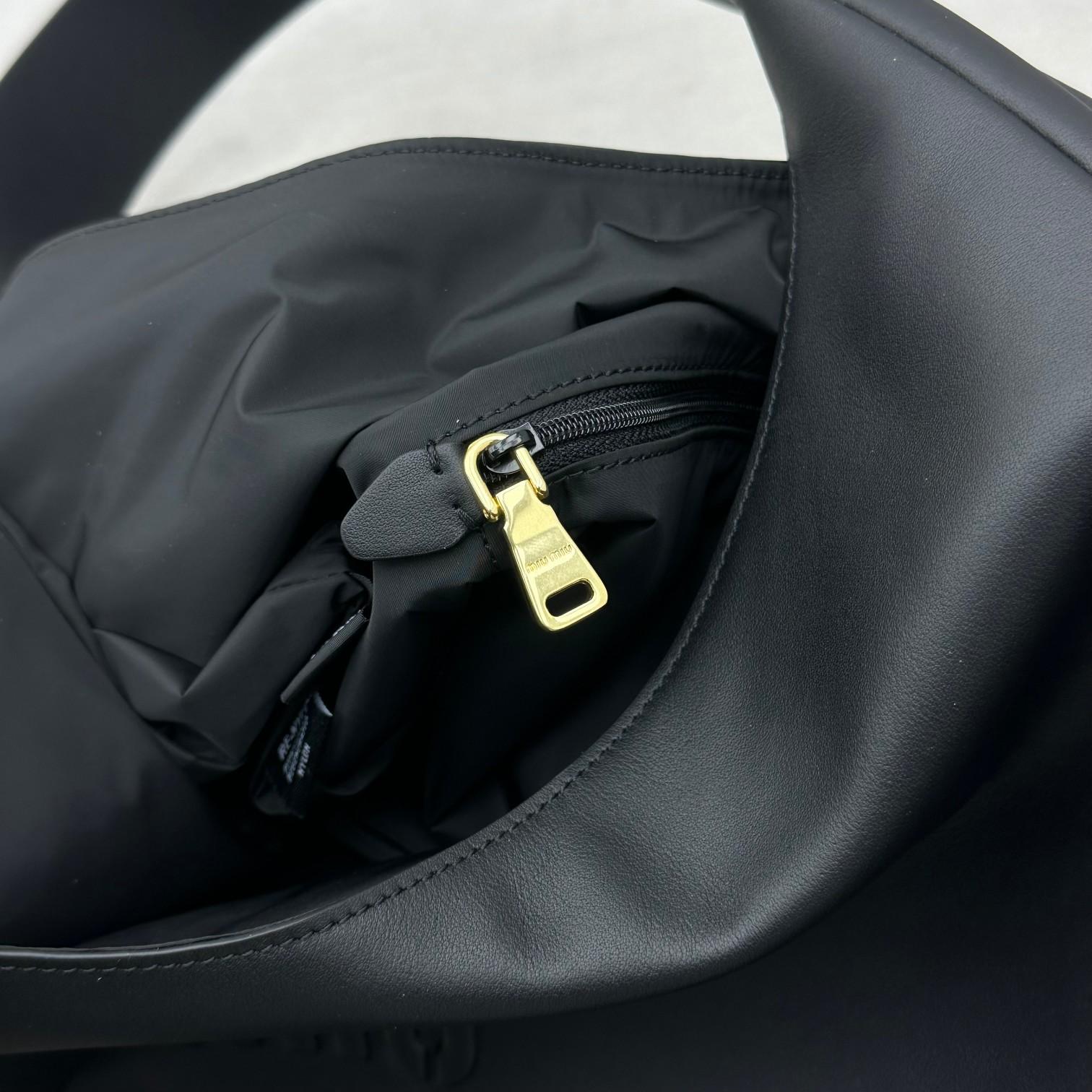 Miu Miu Leather Hobo Bag - DopestKickz