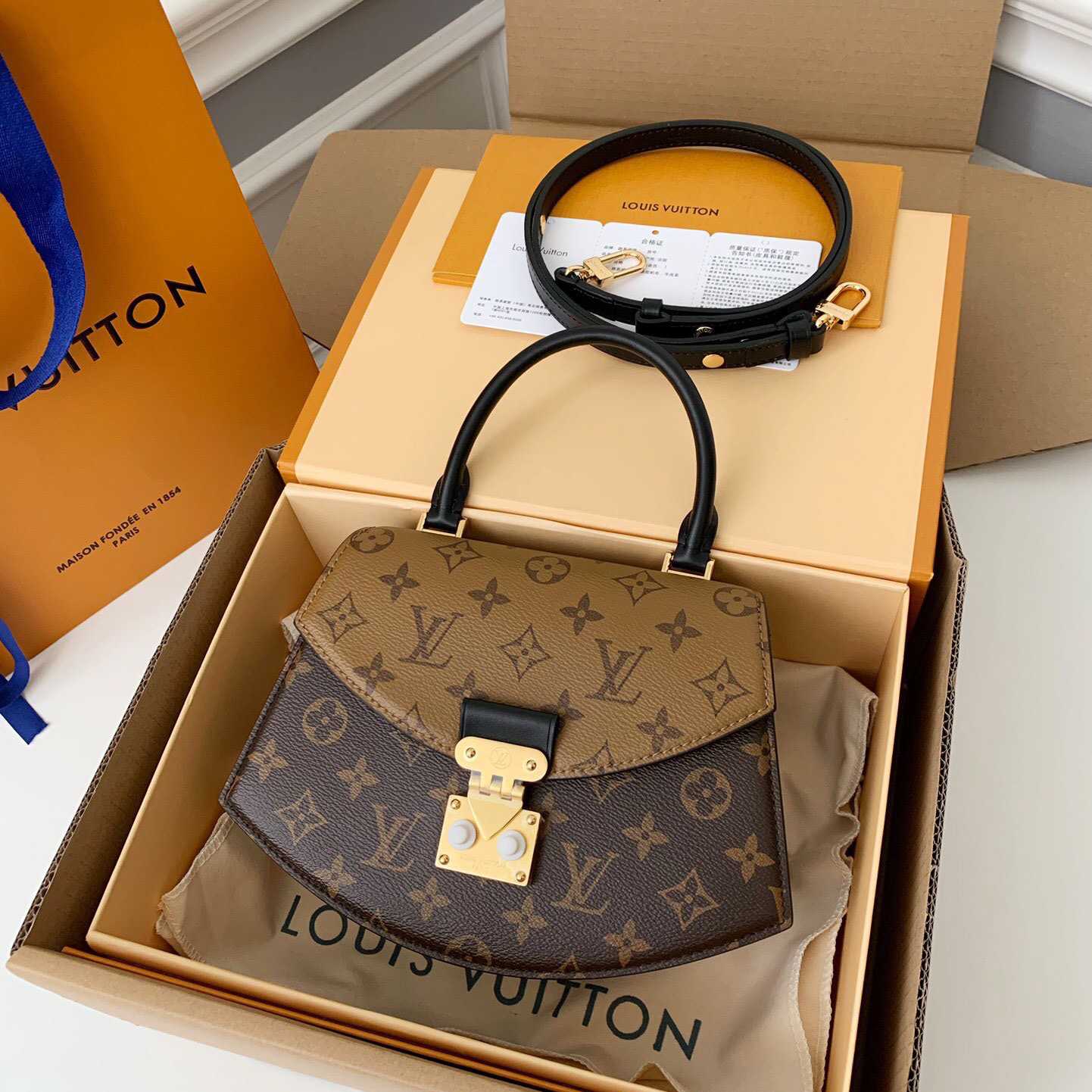 Louis Vuitton Tilsitt Handbag   M46548 - DopestKickz