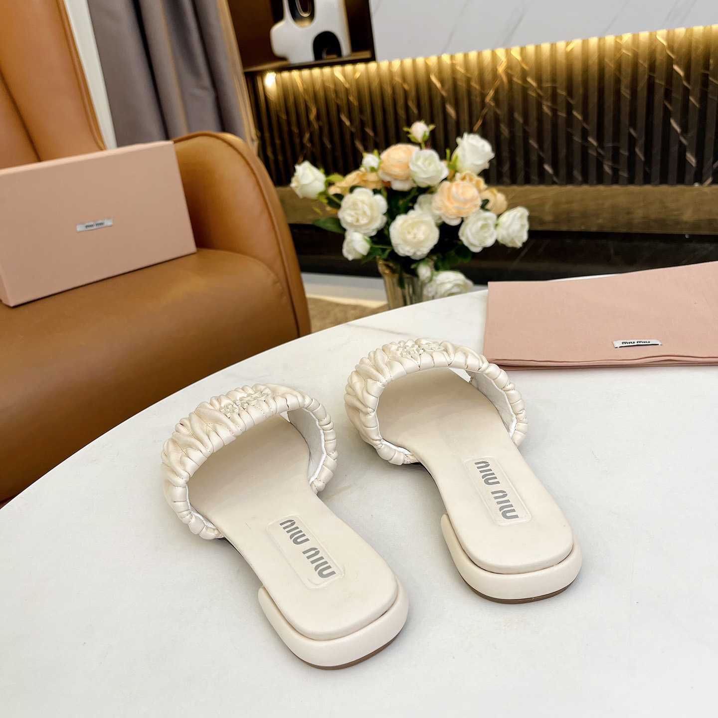 Miu Miu Matelassé Nappa Leather Slides - DopestKickz