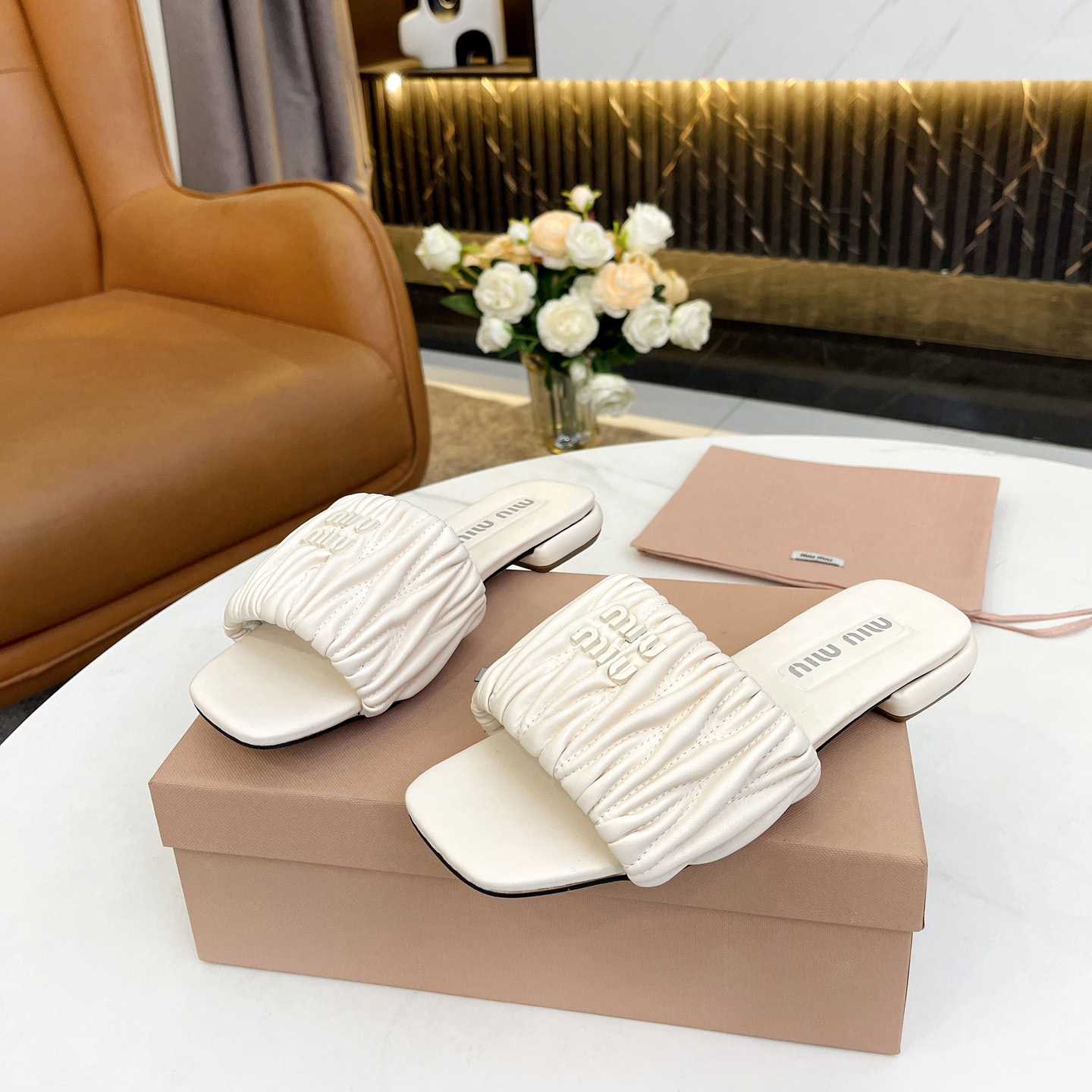 Miu Miu Matelassé Nappa Leather Slides - DopestKickz