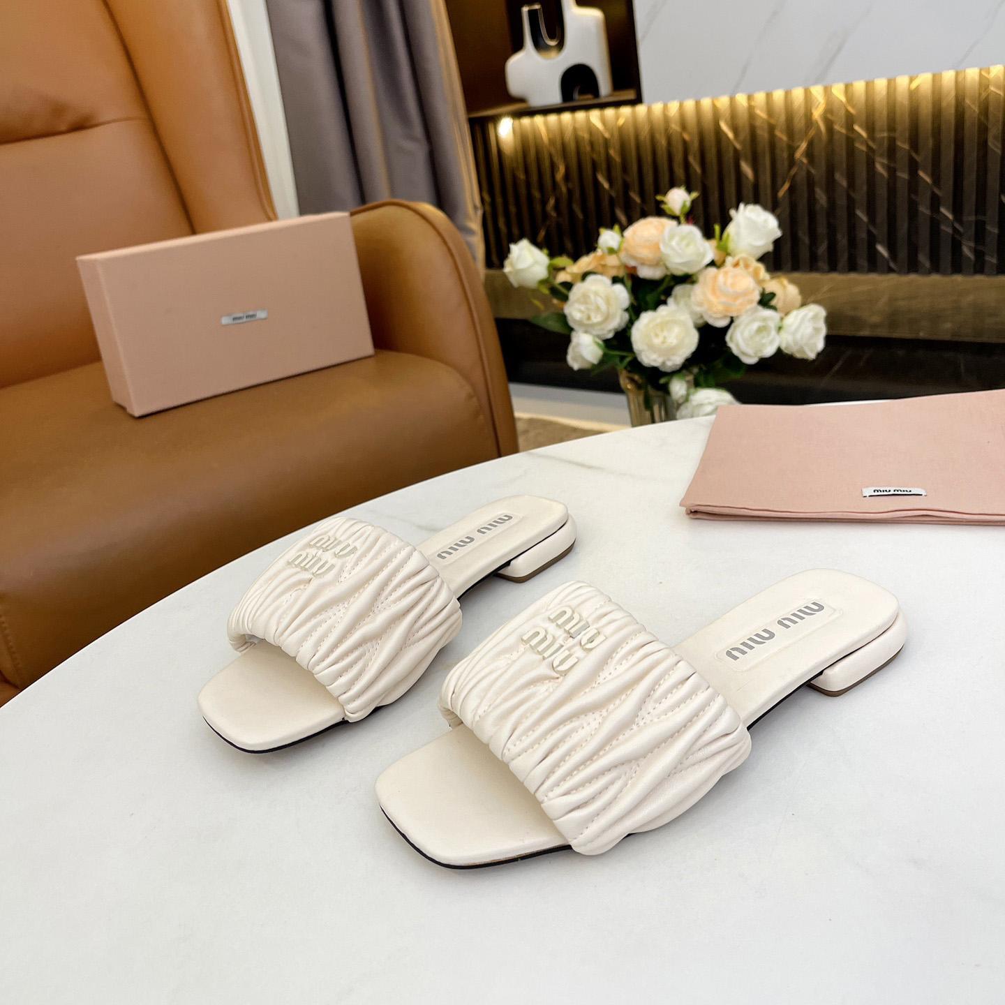 Miu Miu Matelassé Nappa Leather Slides - DopestKickz