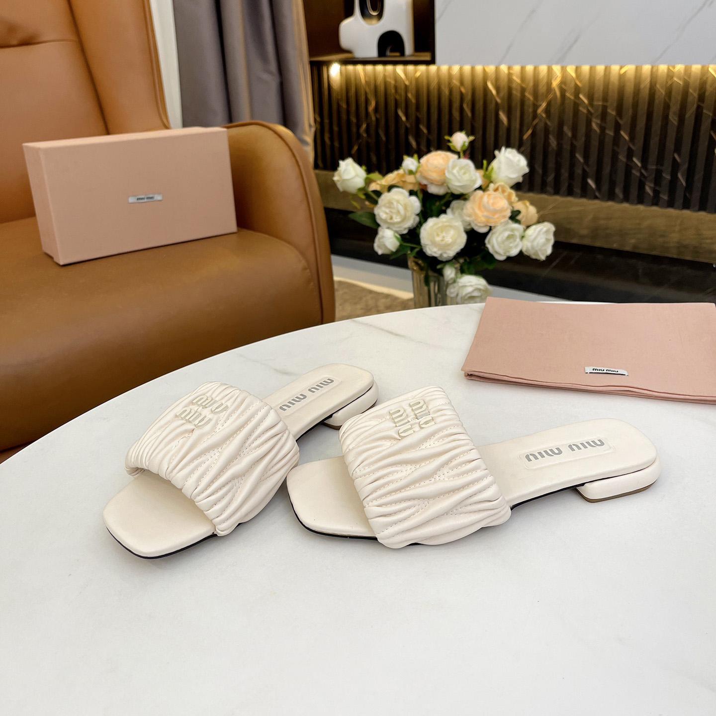 Miu Miu Matelassé Nappa Leather Slides - DopestKickz