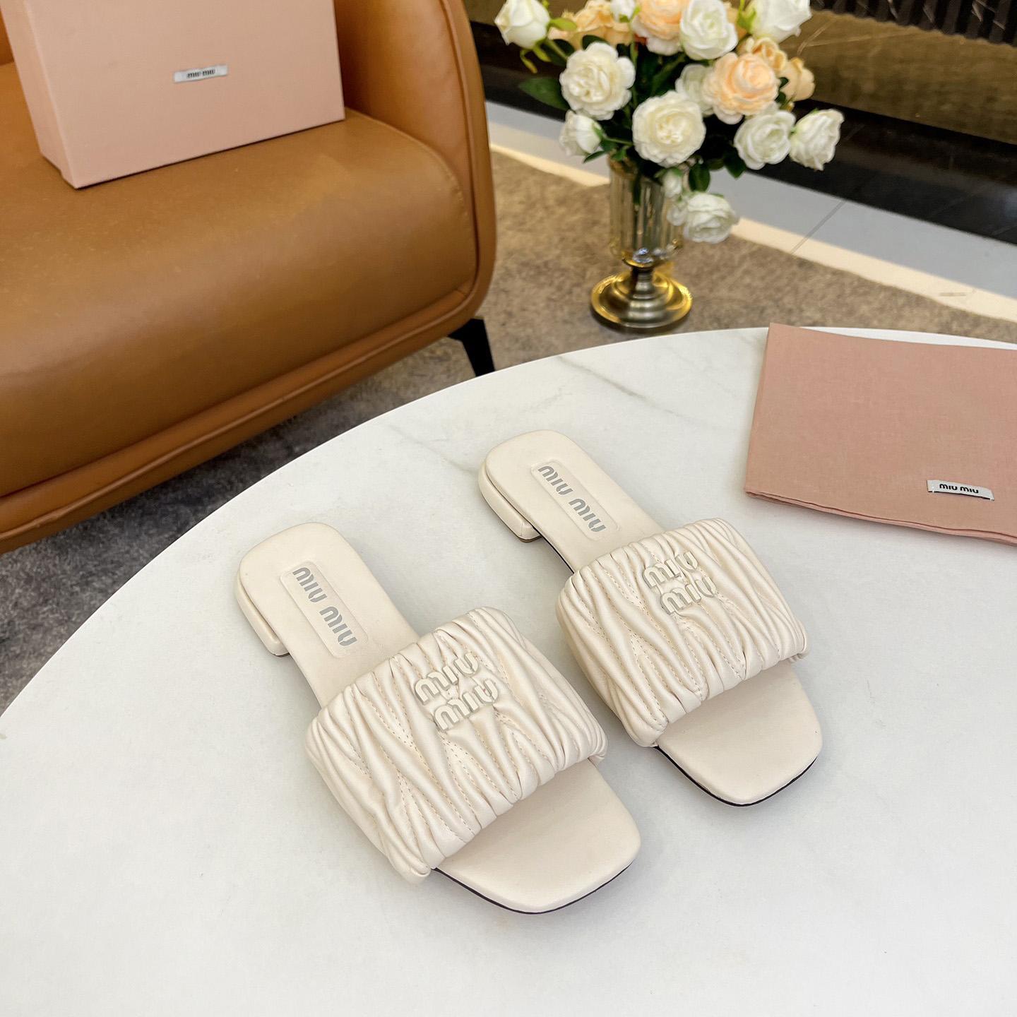 Miu Miu Matelassé Nappa Leather Slides - DopestKickz