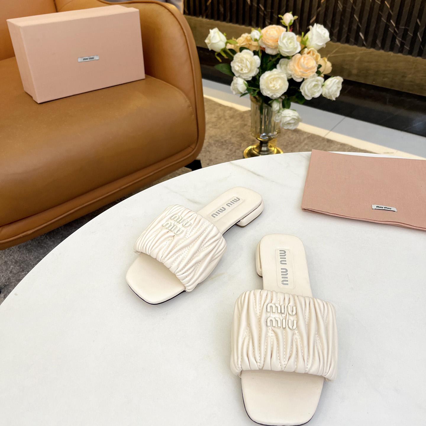 Miu Miu Matelassé Nappa Leather Slides - DopestKickz