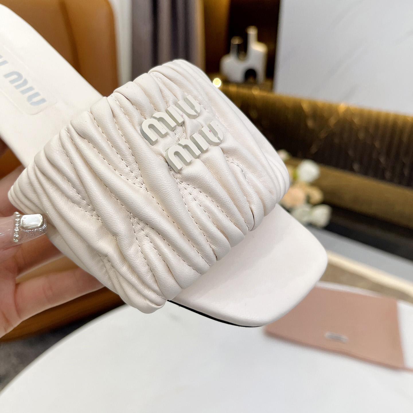 Miu Miu Matelassé Nappa Leather Slides - DopestKickz