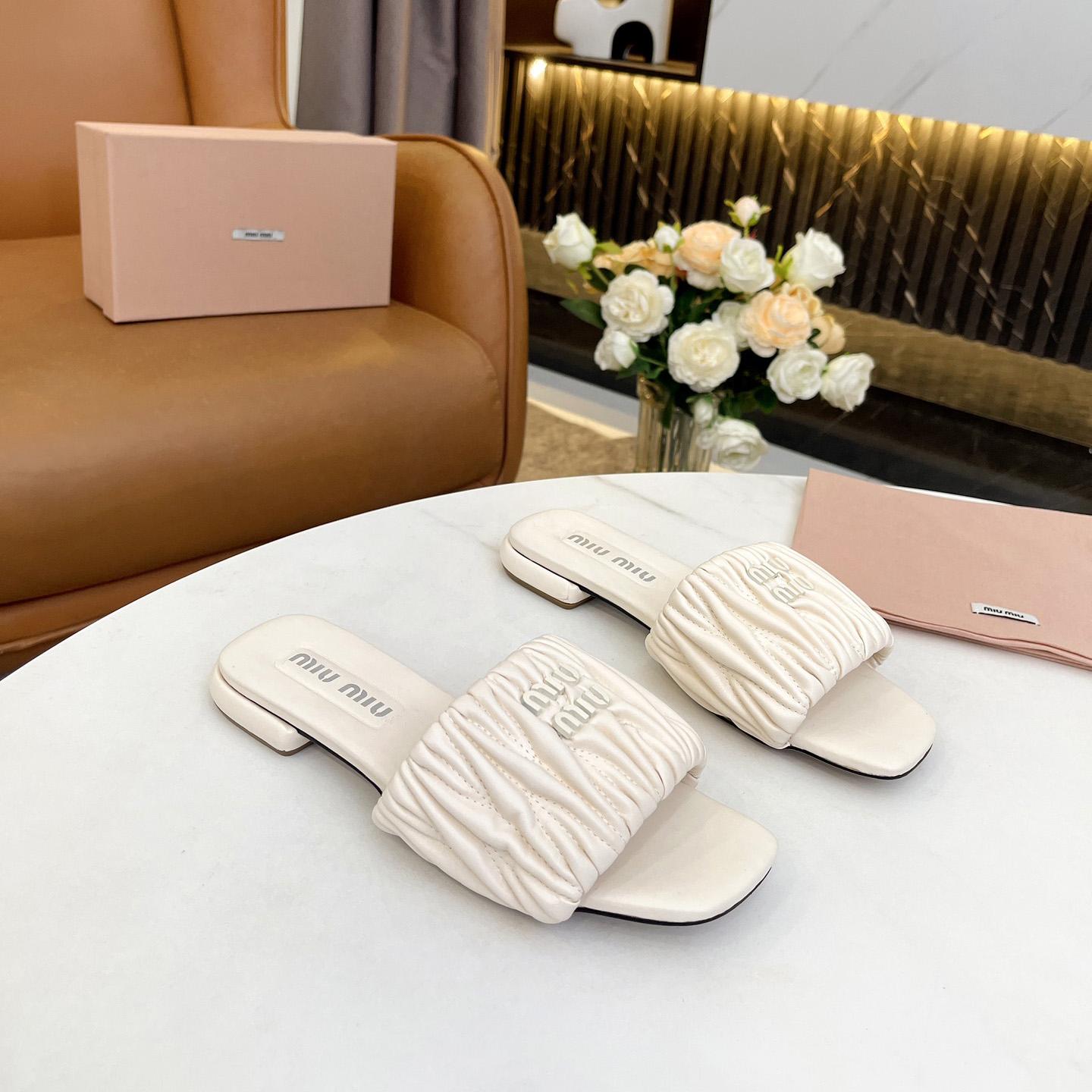 Miu Miu Matelassé Nappa Leather Slides - DopestKickz