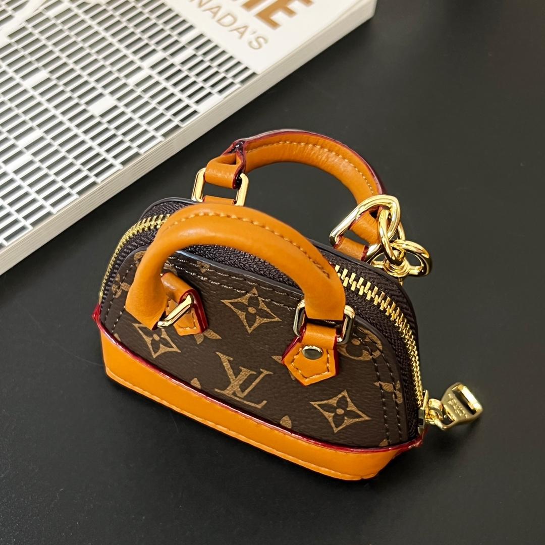 Louis Vuitton Micro Alma Bag Charm   M00995 - DopestKickz