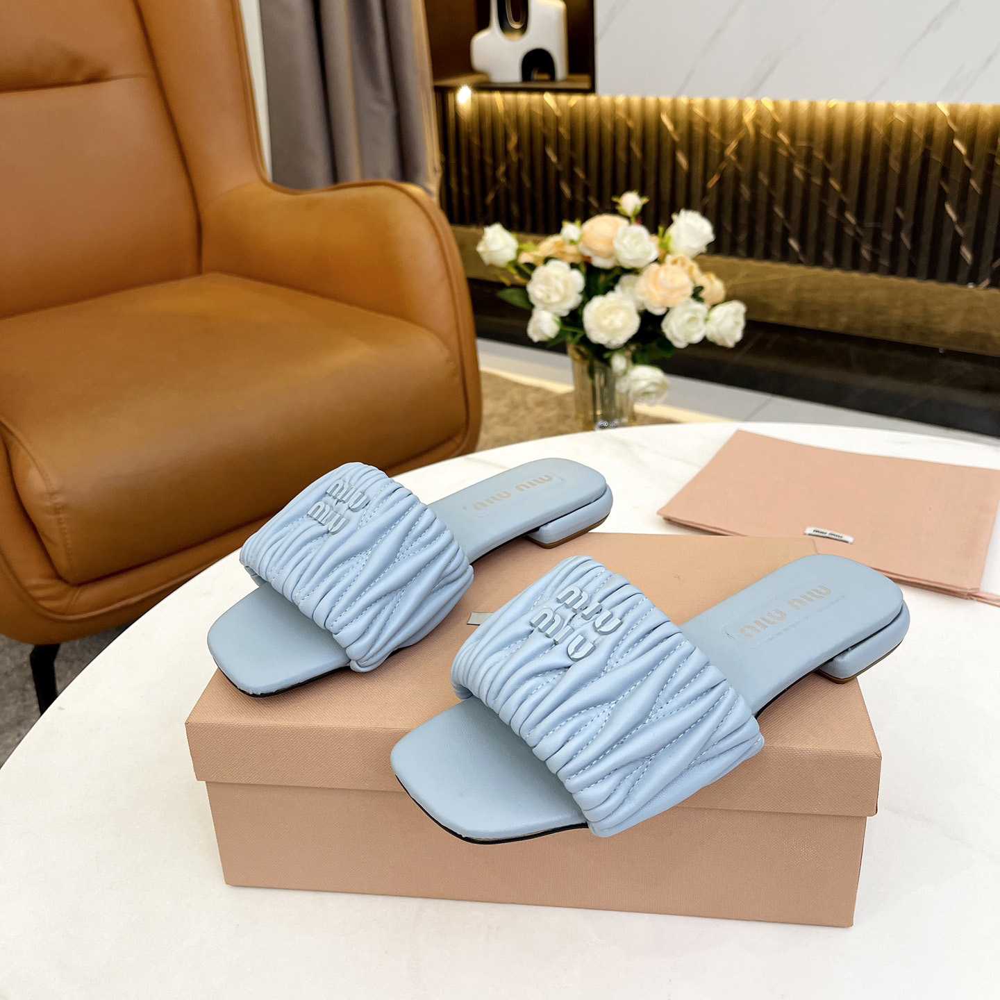 Miu Miu Matelassé Nappa Leather Slides - DopestKickz
