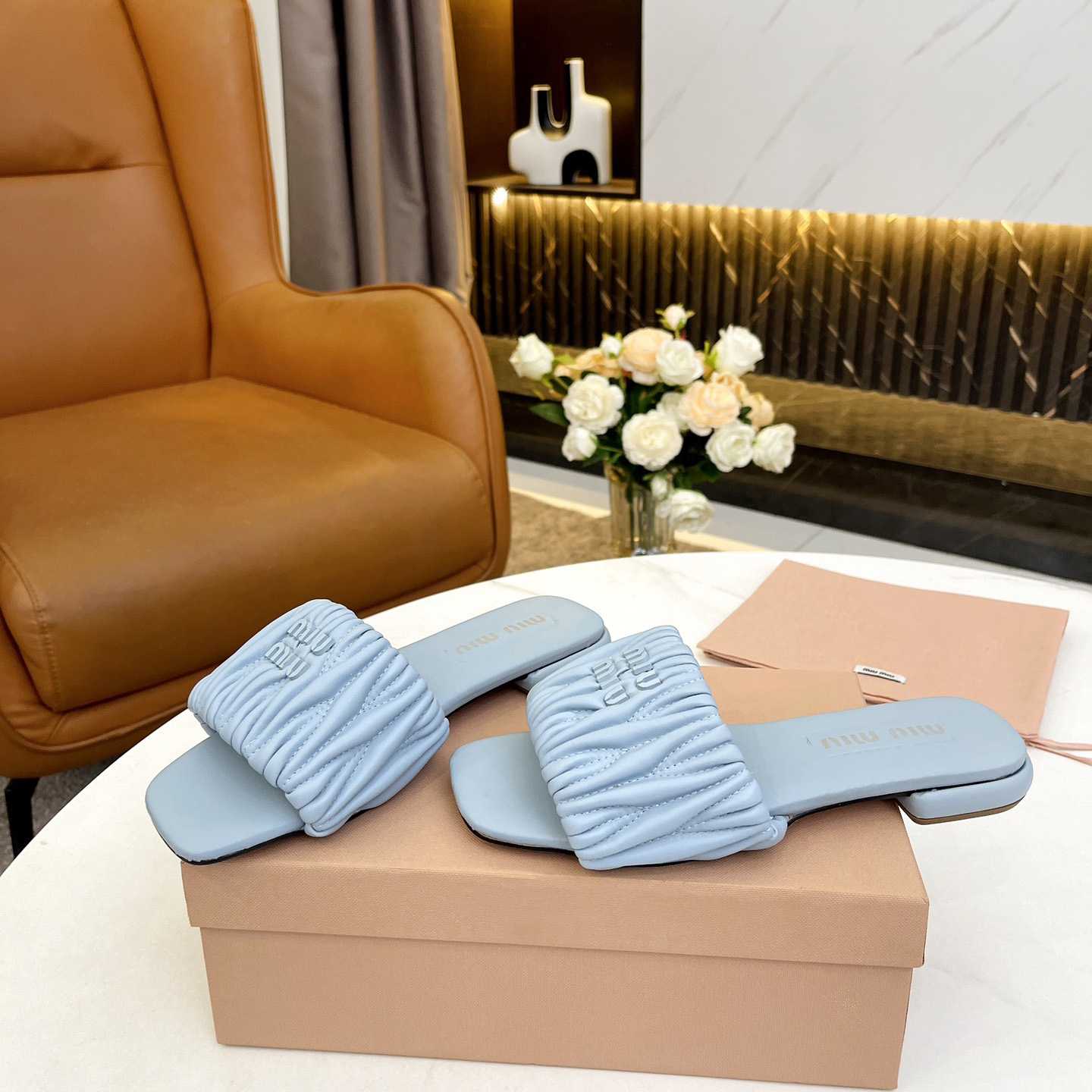 Miu Miu Matelassé Nappa Leather Slides - DopestKickz