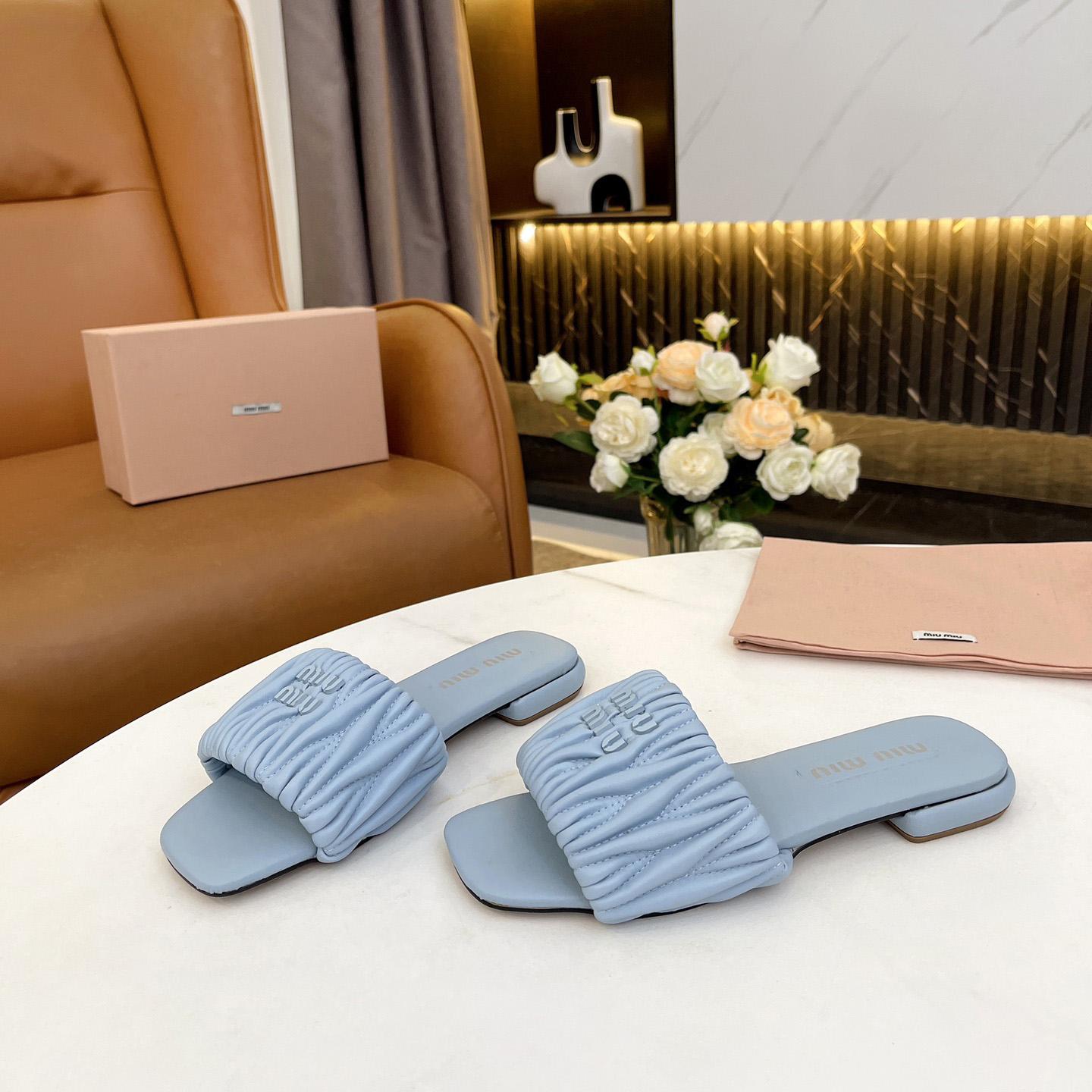 Miu Miu Matelassé Nappa Leather Slides - DopestKickz