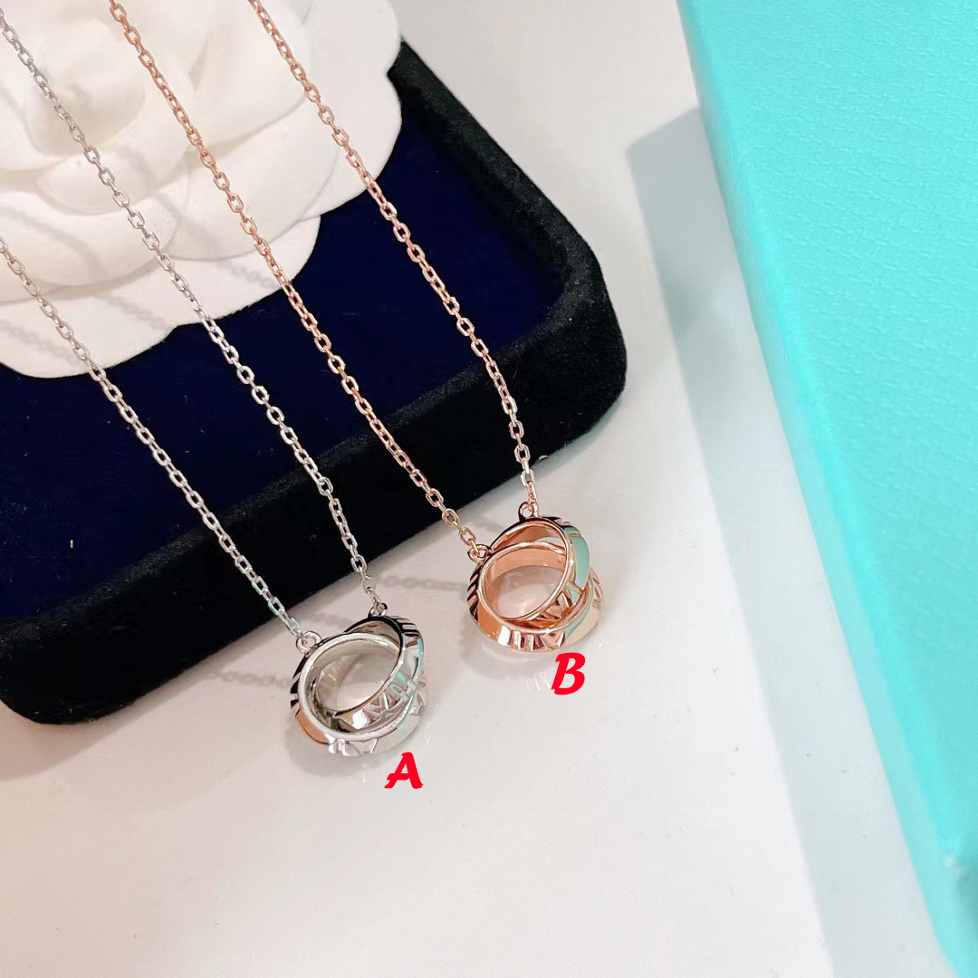 Tiffany&CO x Closed Interlocking Pendant - DopestKickz