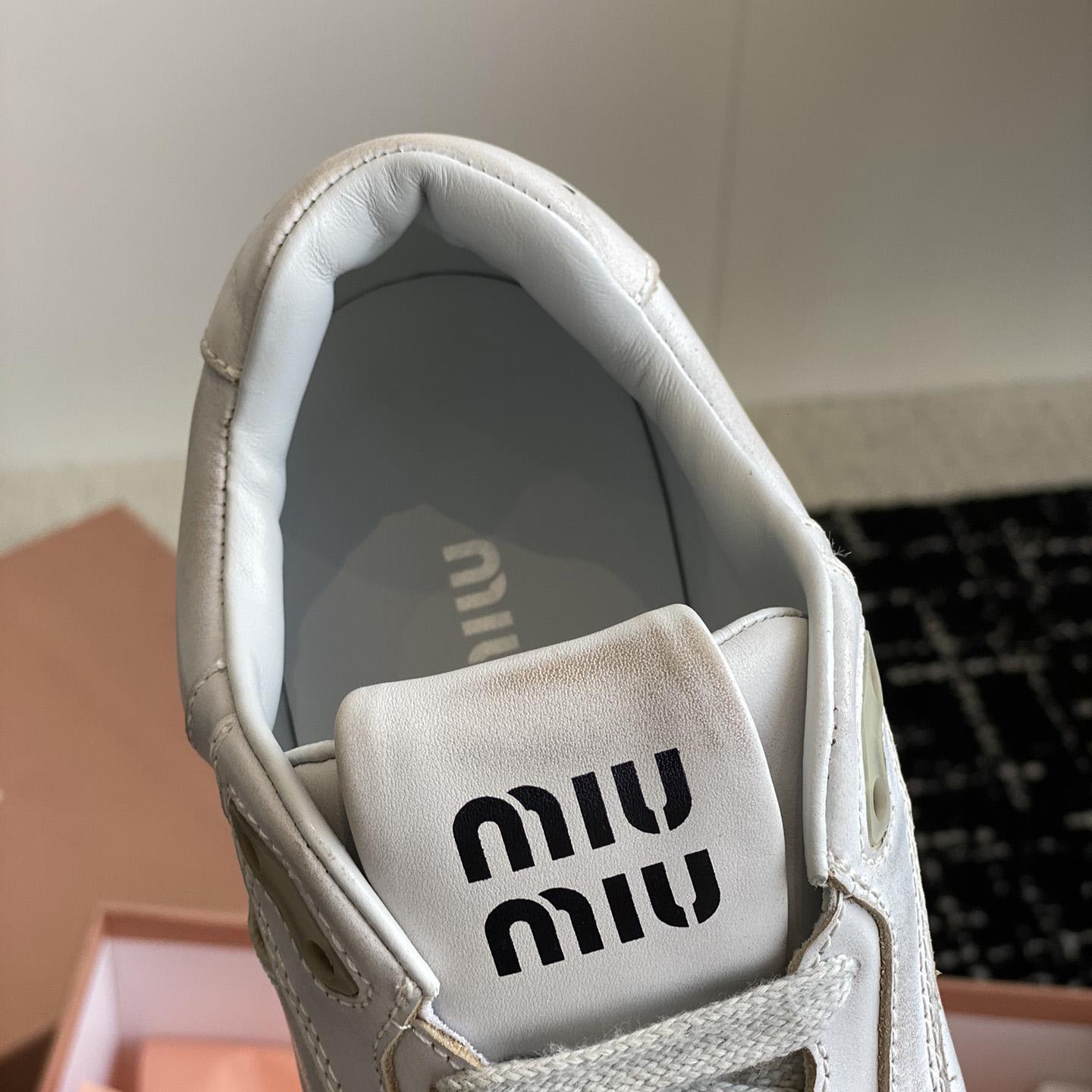 Miu Miu Bleached Leather Sneakers - DopestKickz