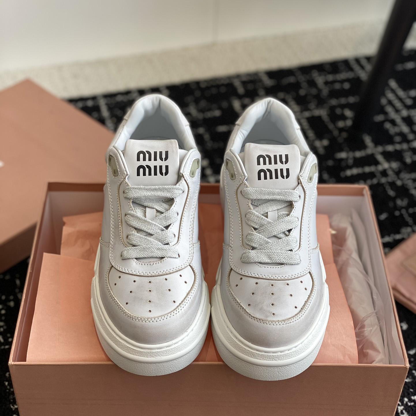Miu Miu Bleached Leather Sneakers - DopestKickz
