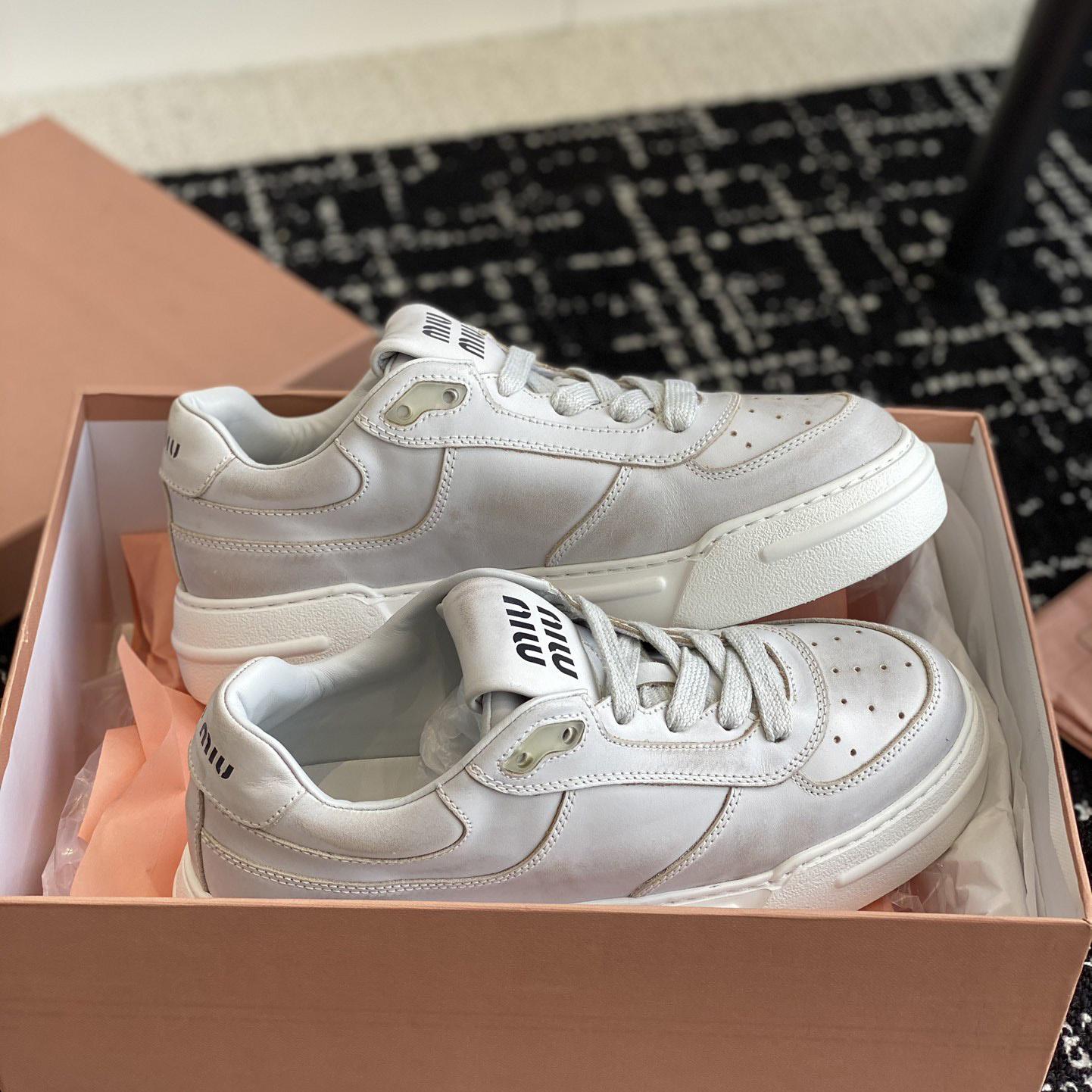 Miu Miu Bleached Leather Sneakers - DopestKickz