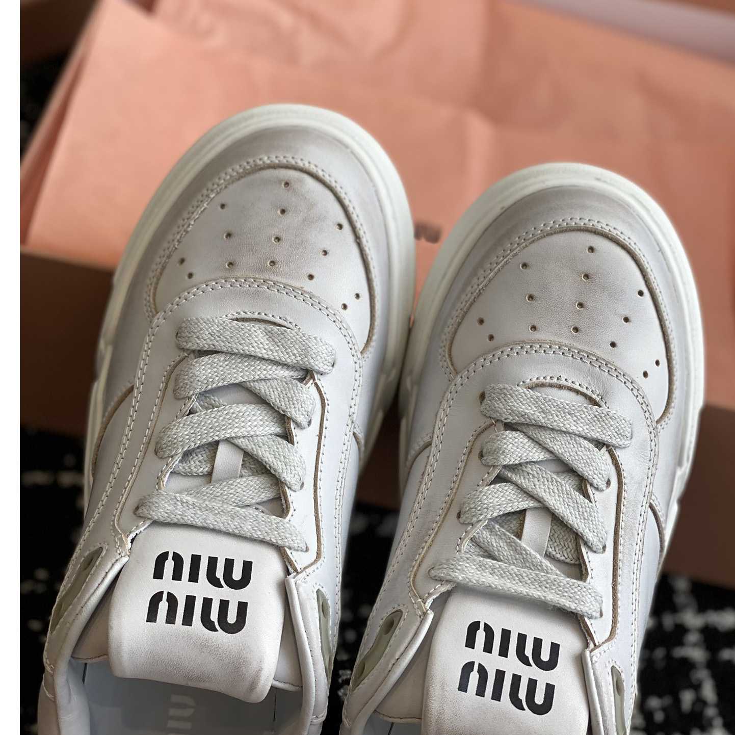 Miu Miu Bleached Leather Sneakers - DopestKickz