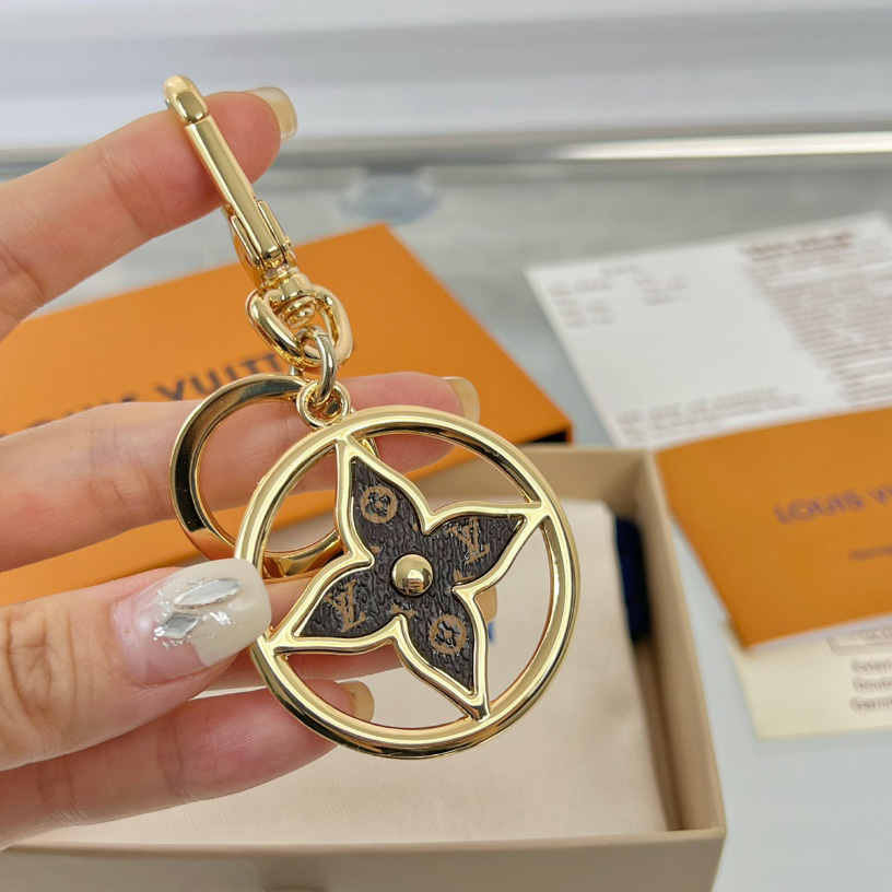 Louis Vuitton Puzzle Flower Monogram Keyring    M01207 - DopestKickz