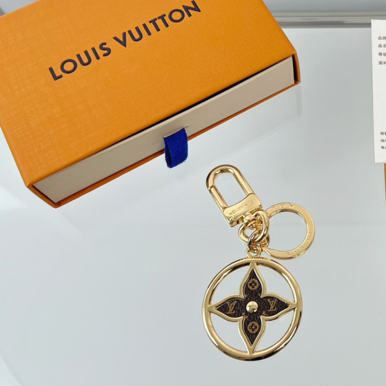Louis Vuitton Puzzle Flower Monogram Keyring    M01207 - DopestKickz