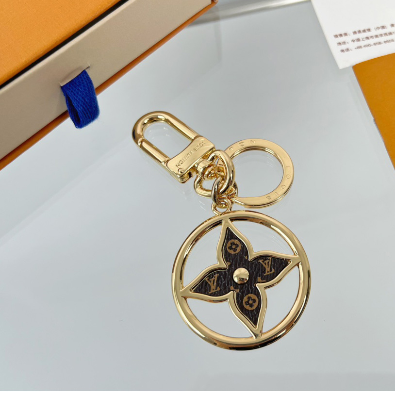 Louis Vuitton Puzzle Flower Monogram Keyring    M01207 - DopestKickz