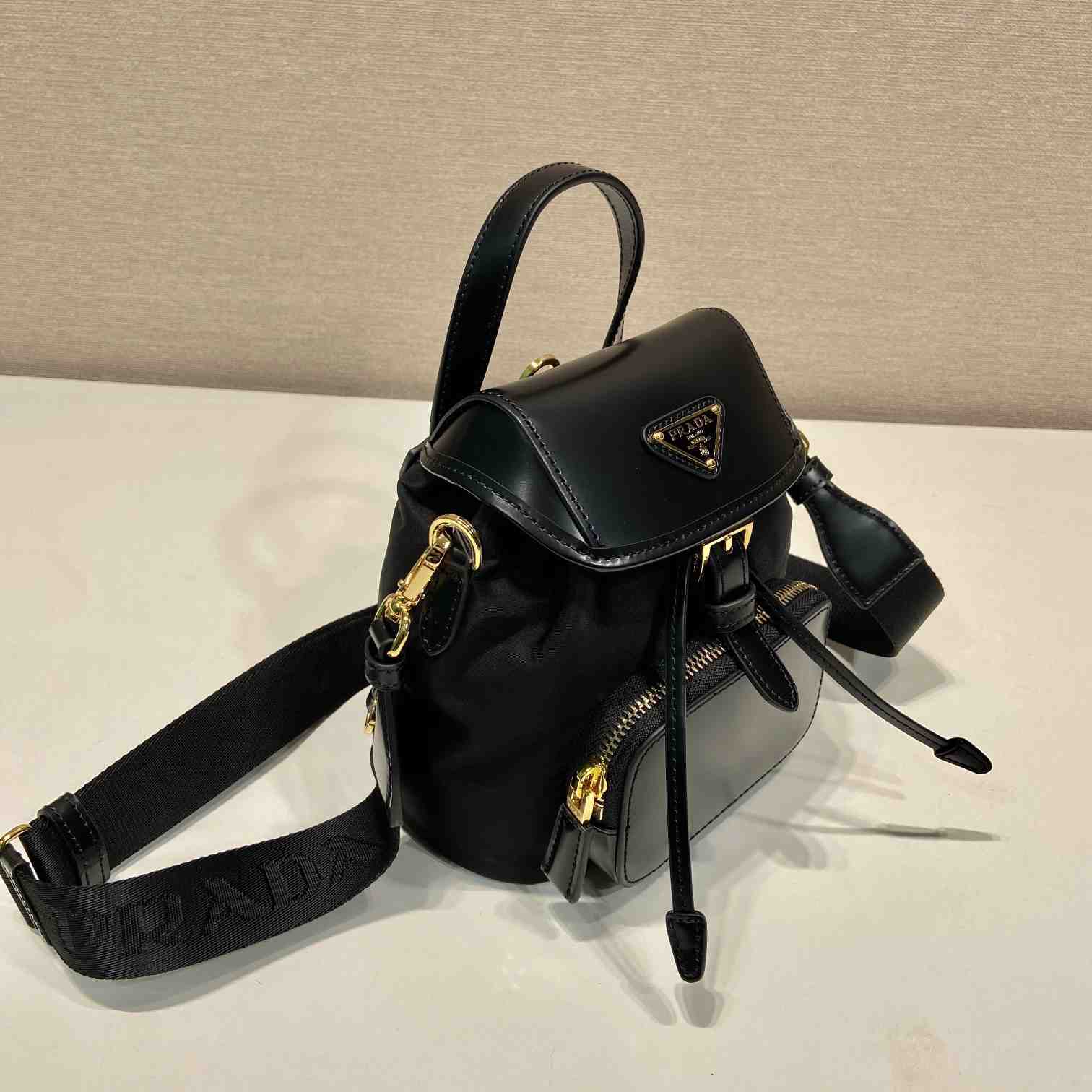 Prada Small Re-Nylon And Brushed Leather Backpack - DopestKickz