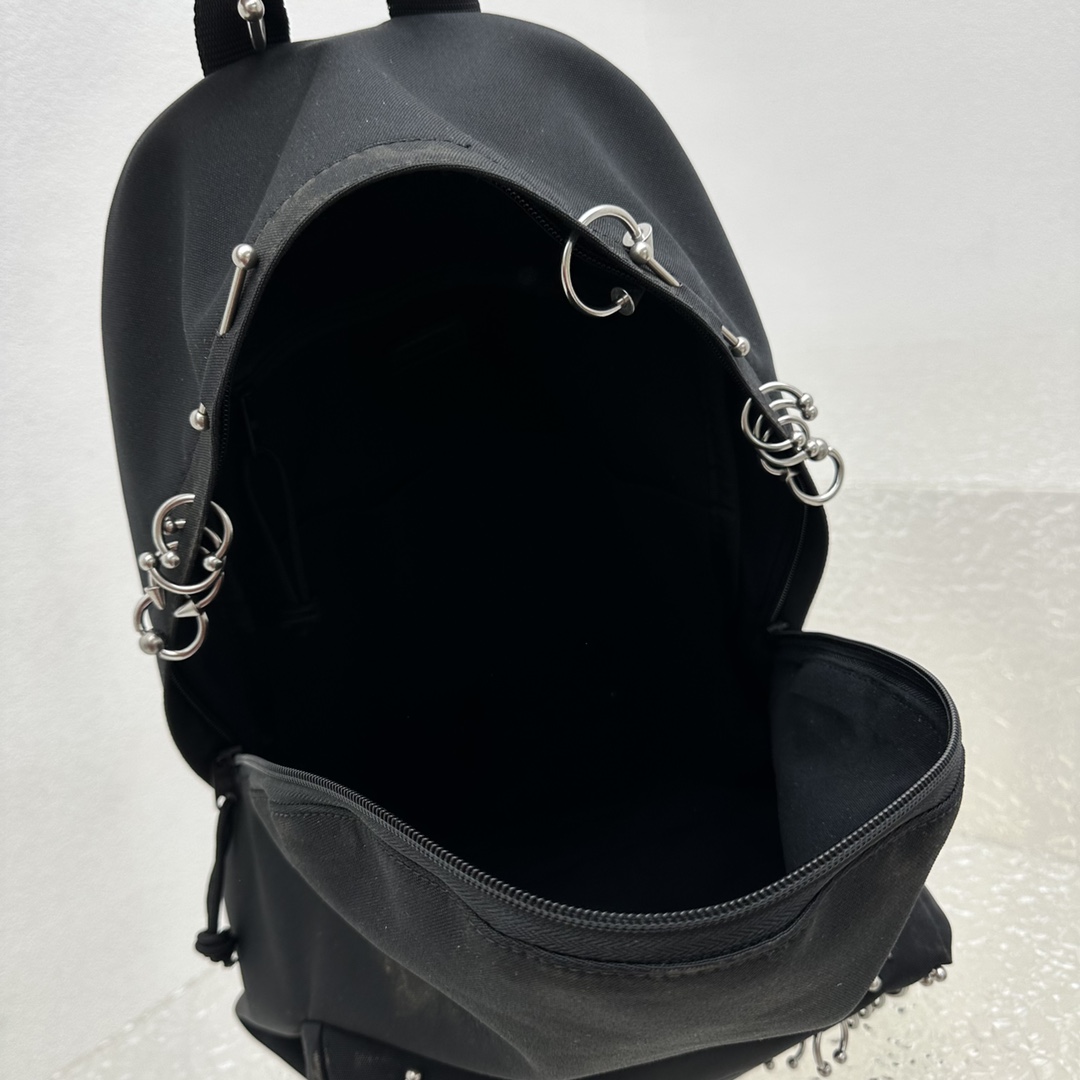 Balenciaga Explorer Backpack With Piercings In Black - DopestKickz