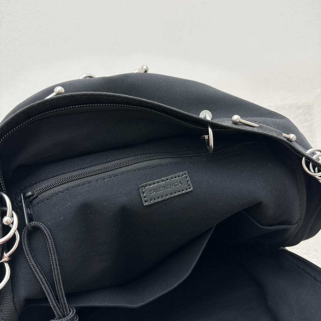 Balenciaga Explorer Backpack With Piercings In Black - DopestKickz