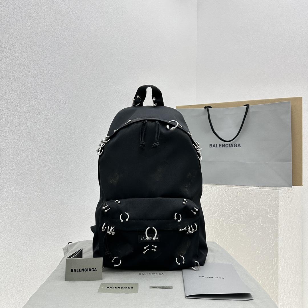Balenciaga Explorer Backpack With Piercings In Black - DopestKickz