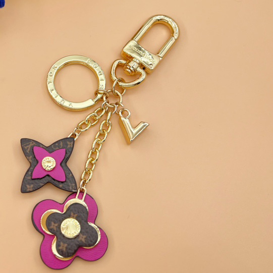 Louis Vuitton Blooming Flowers Bag Charm and Key Holder   M63084 - DopestKickz