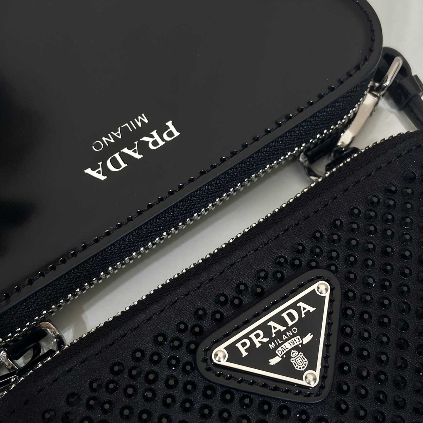 Prada Triangular Embellished Satin And Leather Mini-pouch - DopestKickz