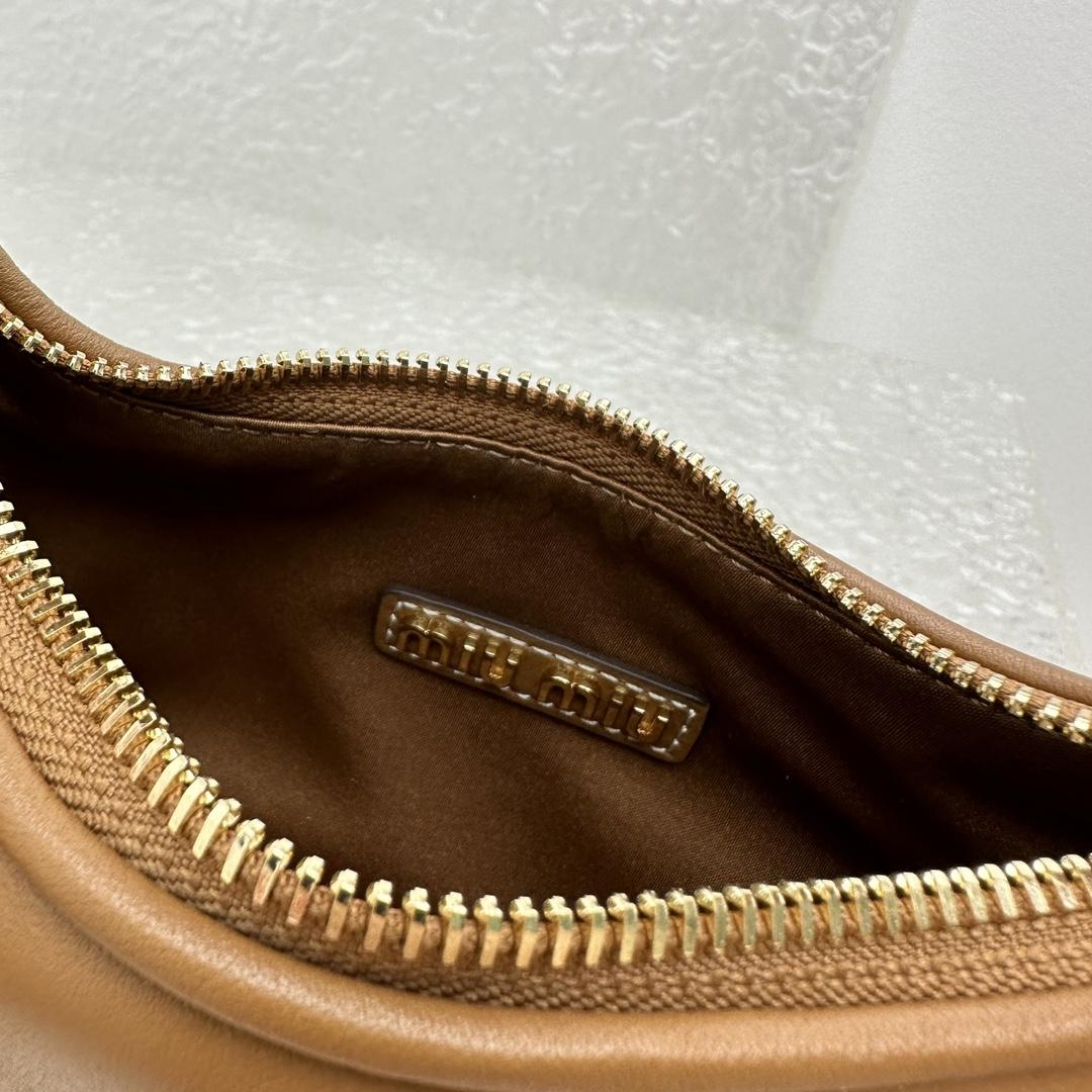 Miu Miu Leather Hobo Bag - DopestKickz