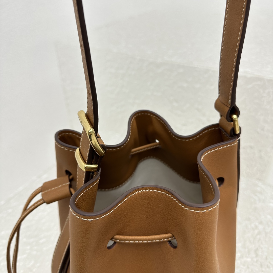 Miu Miu Leather Bucket Bag - DopestKickz