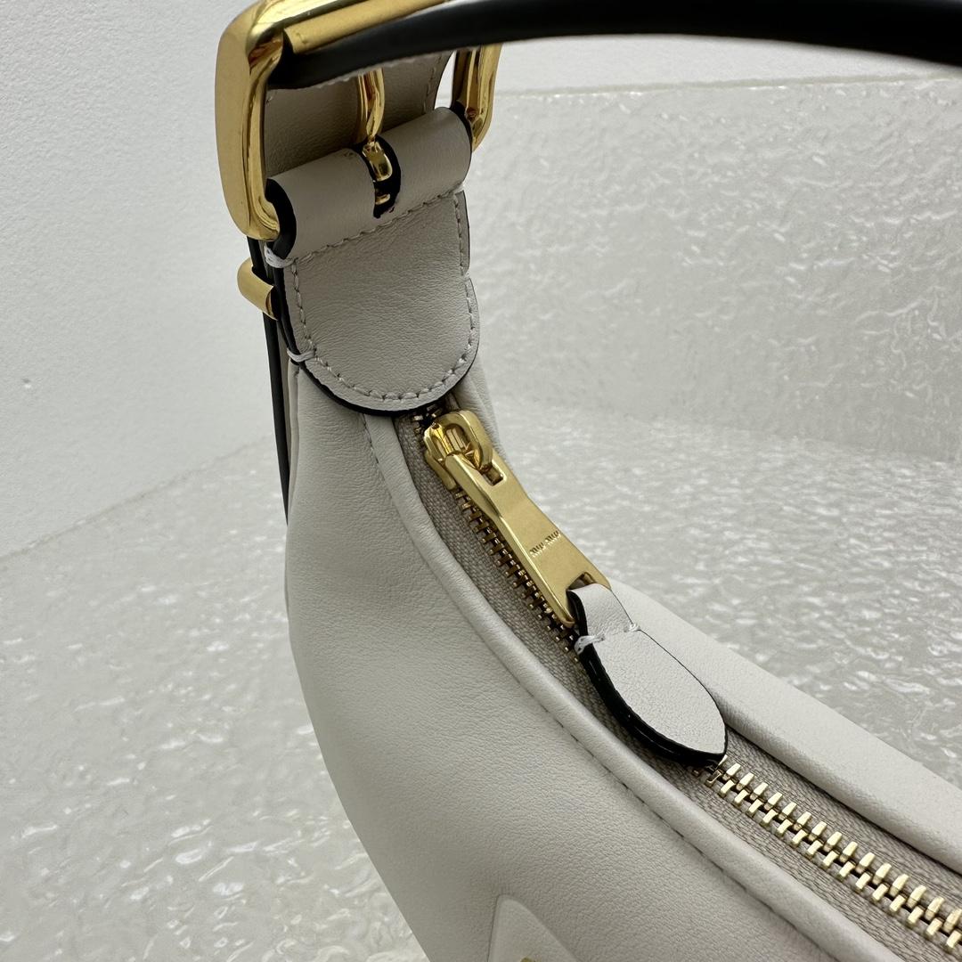 Miu Miu Leather Hobo Bag - DopestKickz
