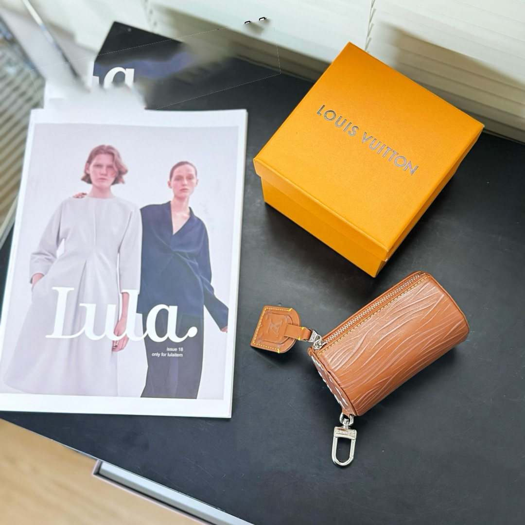 Louis Vuitton Soft Polochon Pouch Key Holder And Bag Charm      M01401 - DopestKickz