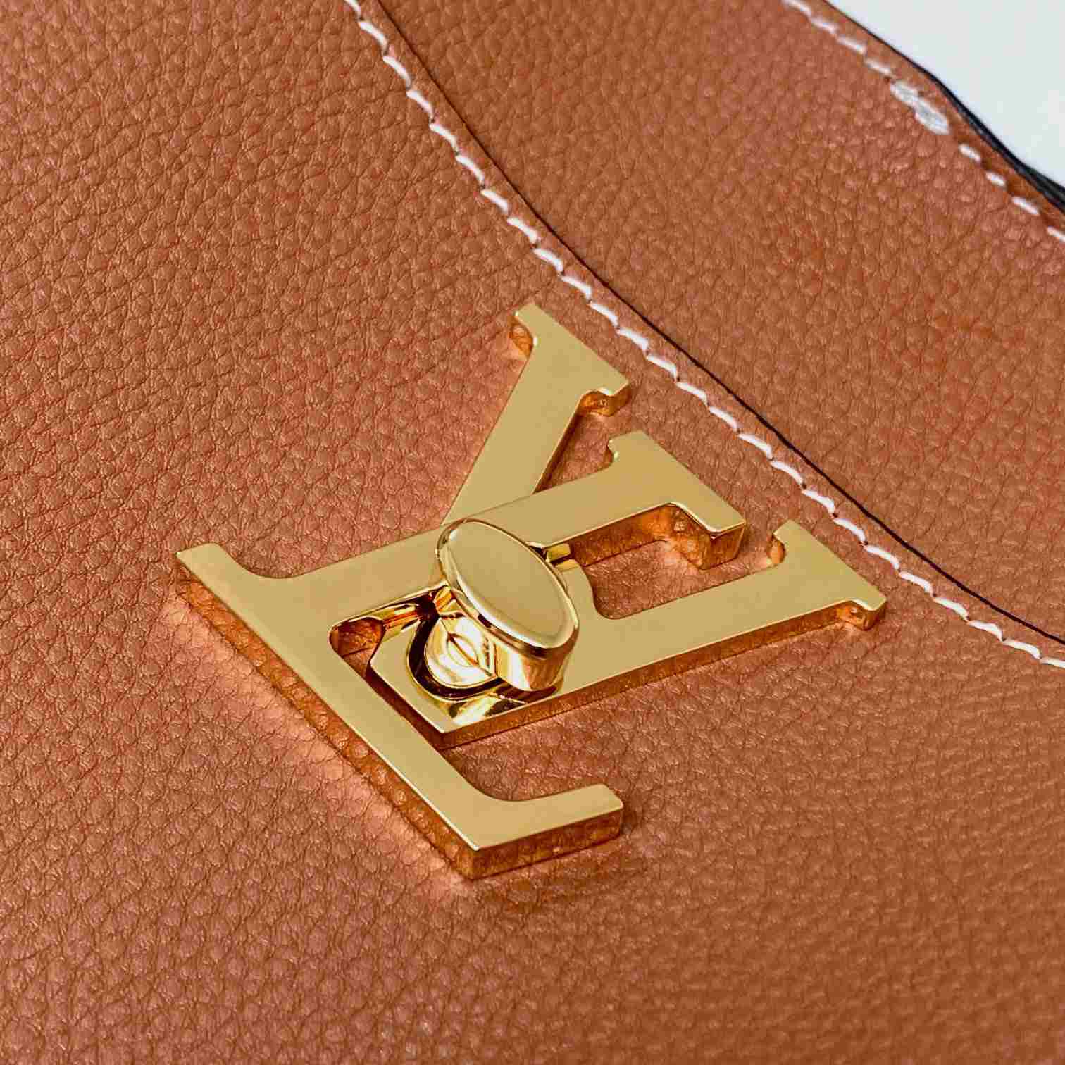 Louis Vuitton Lock and Walk    M24165 - DopestKickz