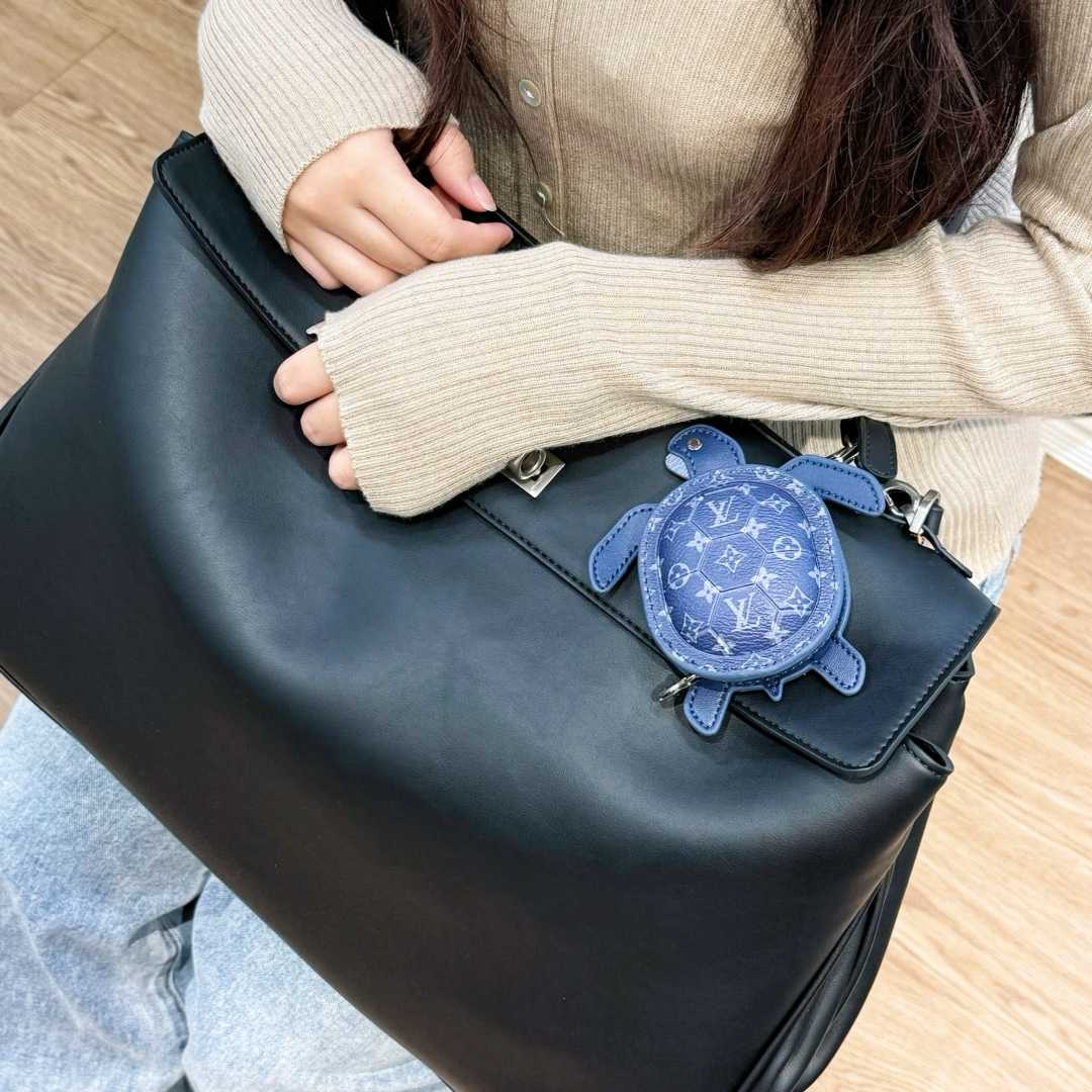 Louis Vuitton LV Turtle Pouch Bag Charm  M02047 - DopestKickz