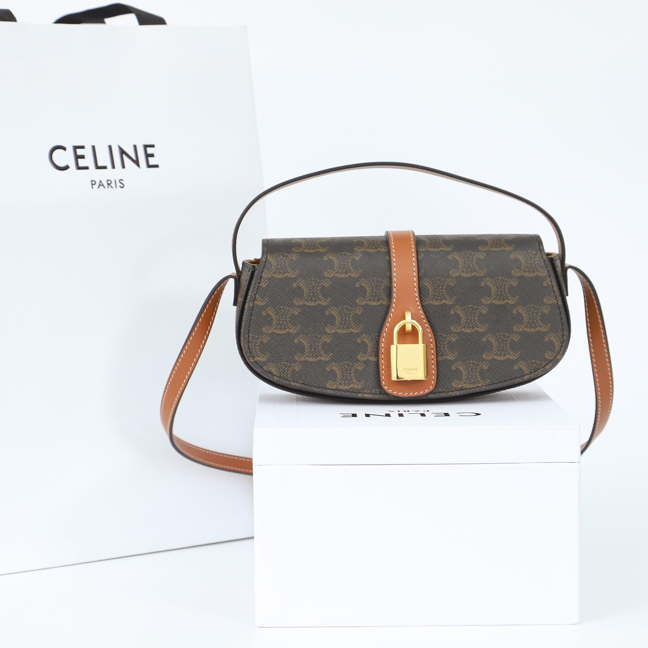 Celine Clutch On Strap Tabou In Triomphe Canvas And Calfskin - DopestKickz