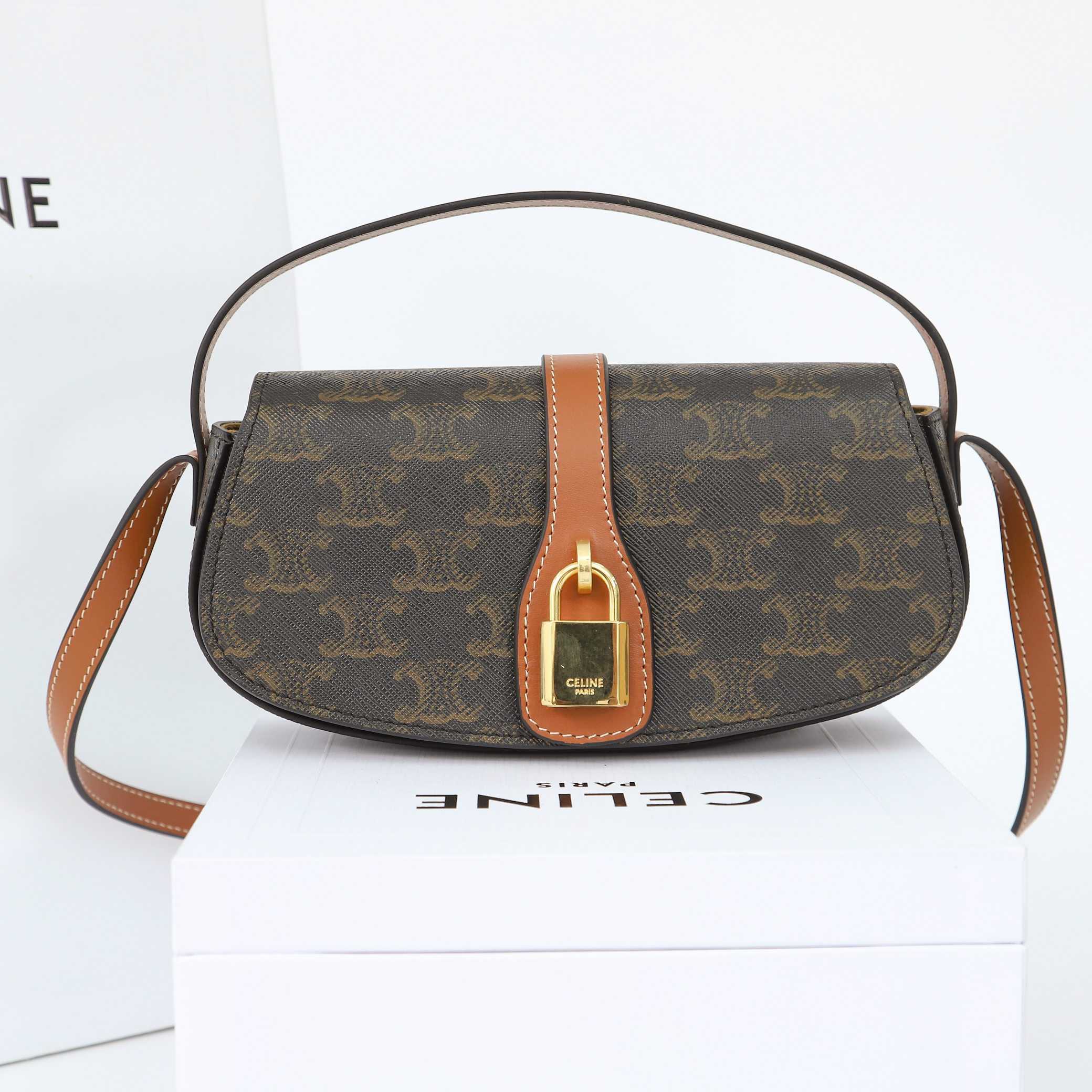 Celine Clutch On Strap Tabou In Triomphe Canvas And Calfskin - DopestKickz