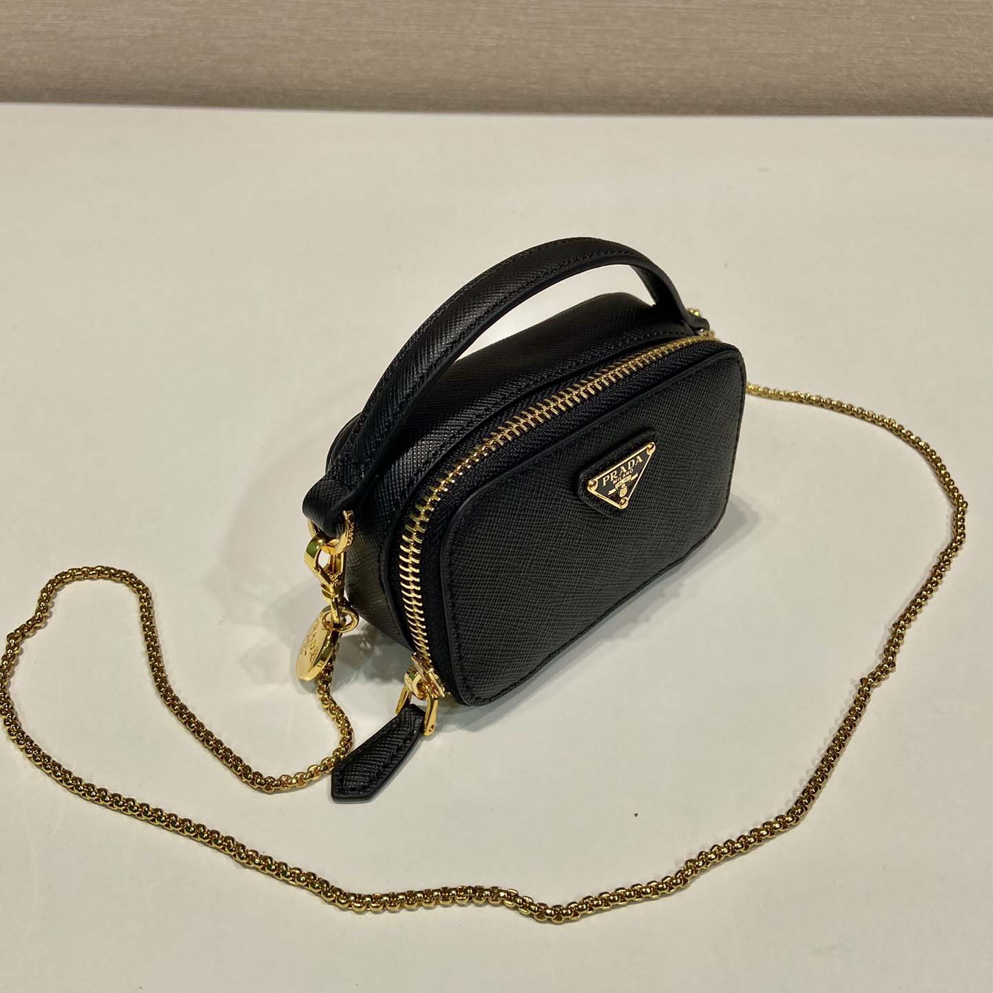 Prada Saffiano Leather Mini-pouch - DopestKickz