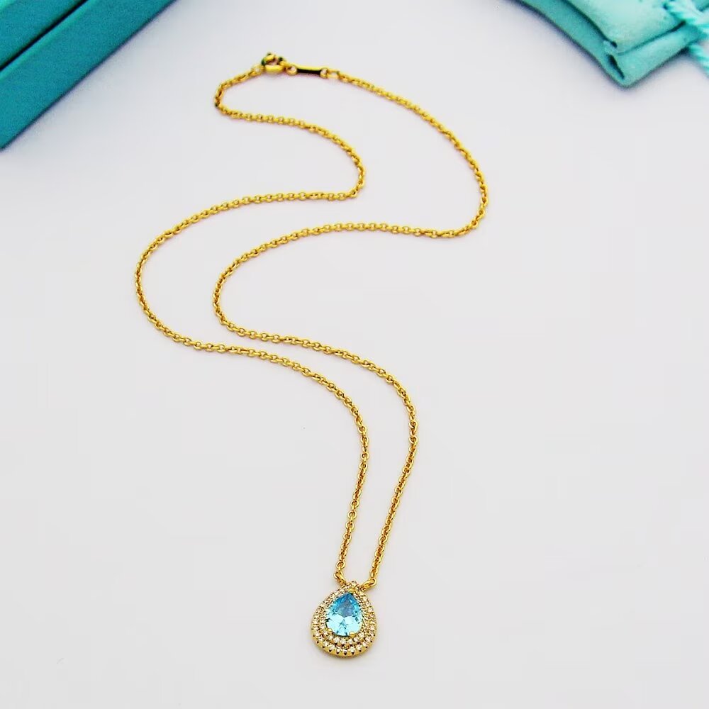 Tiffany & Co. Aquamarine and Diamond Pendant - DopestKickz