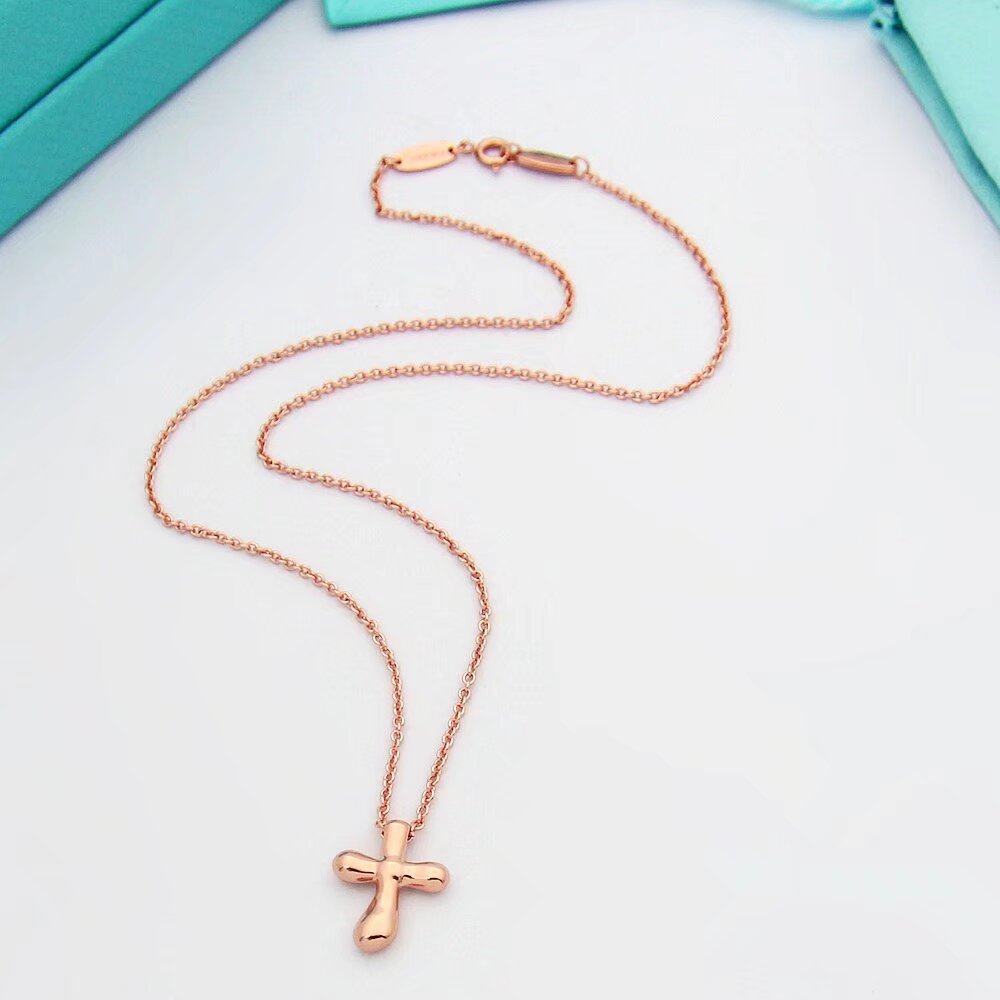 Tiffany & Co. Cross Pendant - DopestKickz