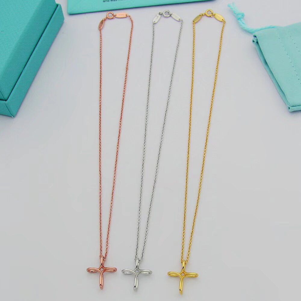 Tiffany & Co. Infinity Cross Pendant - DopestKickz