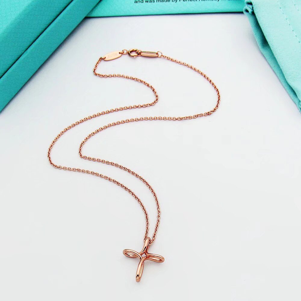 Tiffany & Co. Infinity Cross Pendant - DopestKickz