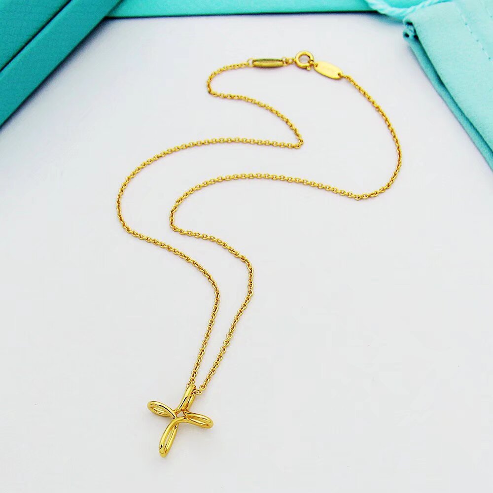 Tiffany & Co. Infinity Cross Pendant - DopestKickz