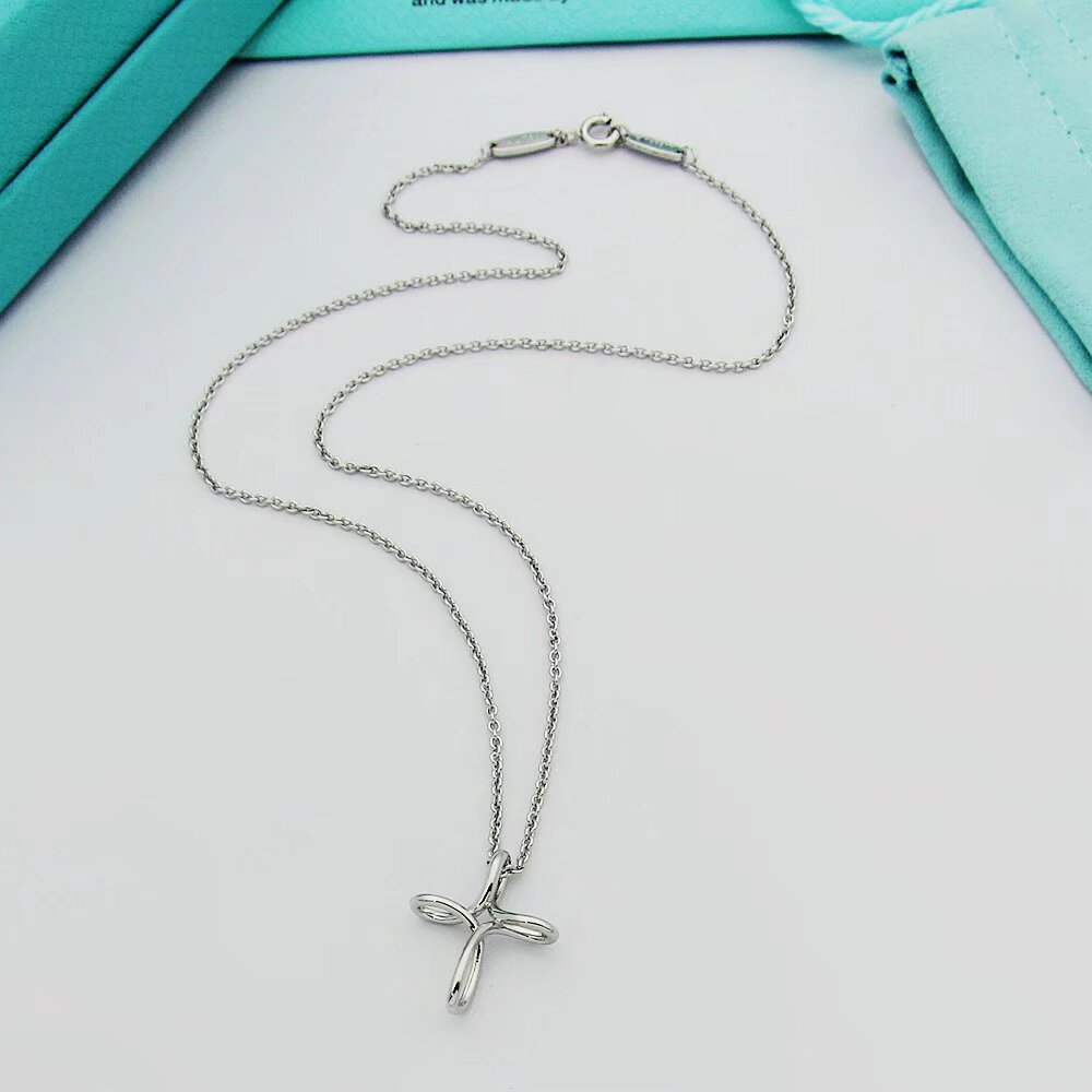Tiffany & Co. Infinity Cross Pendant - DopestKickz
