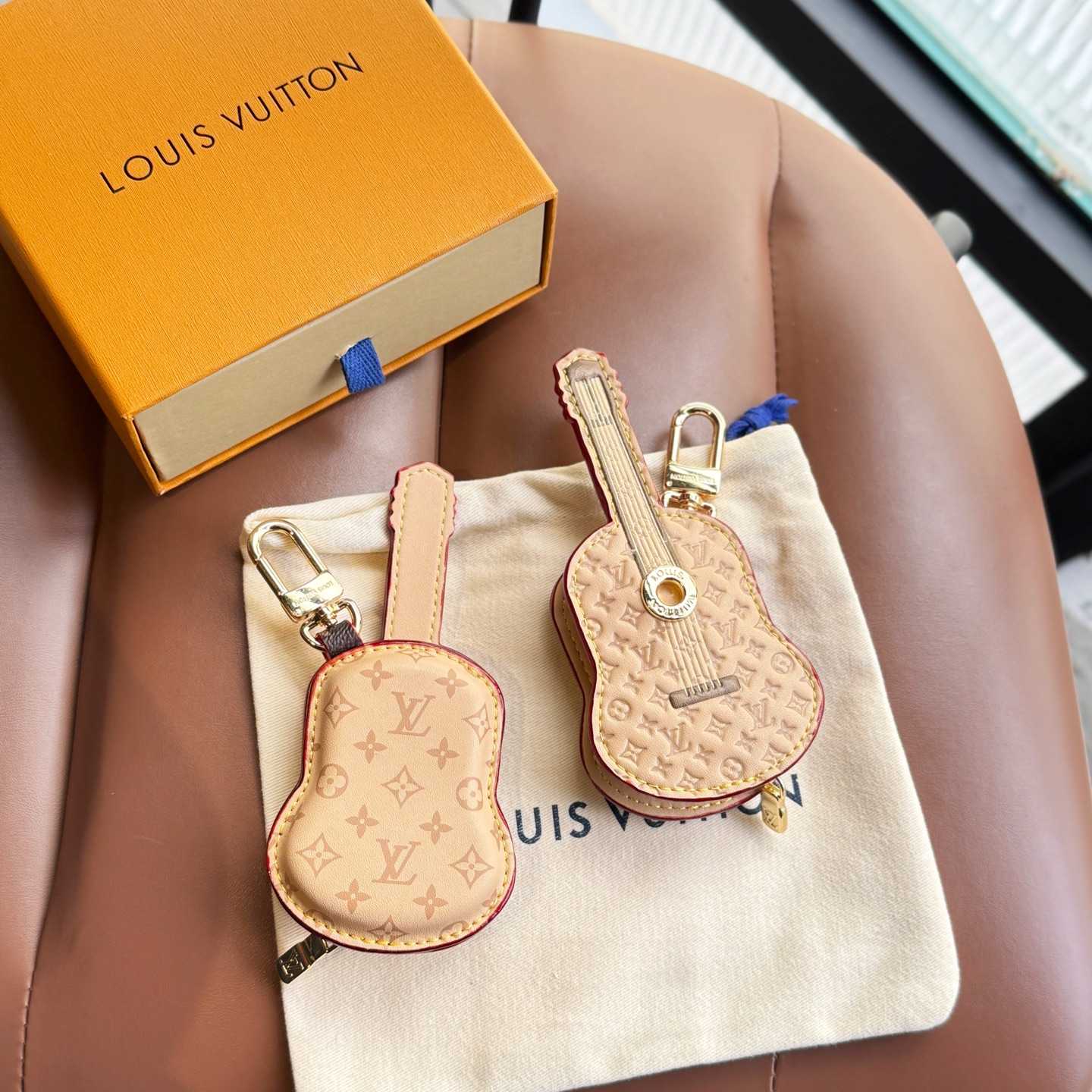 Louis Vuitton Guitar Pouch Bag Charm   M02032 - DopestKickz