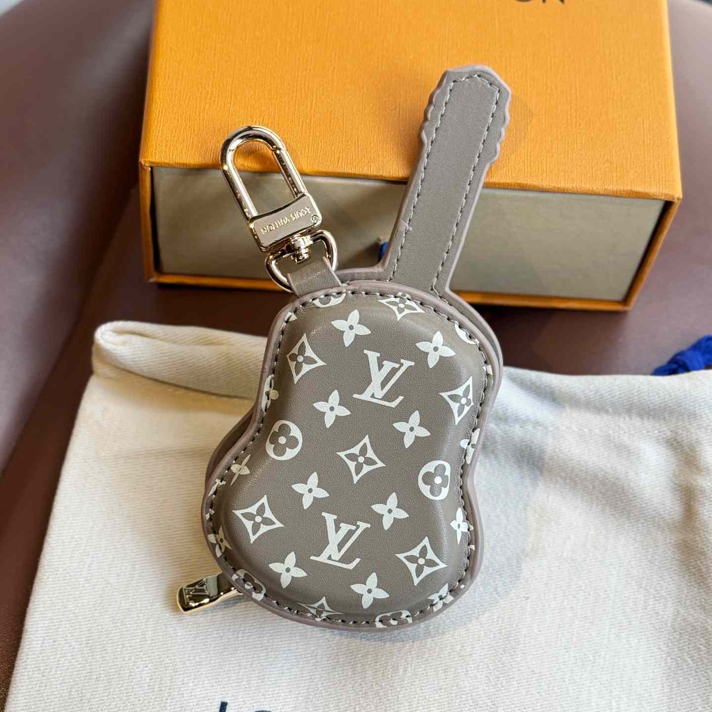 Louis Vuitton Guitar Pouch Bag Charm   M02032 - DopestKickz